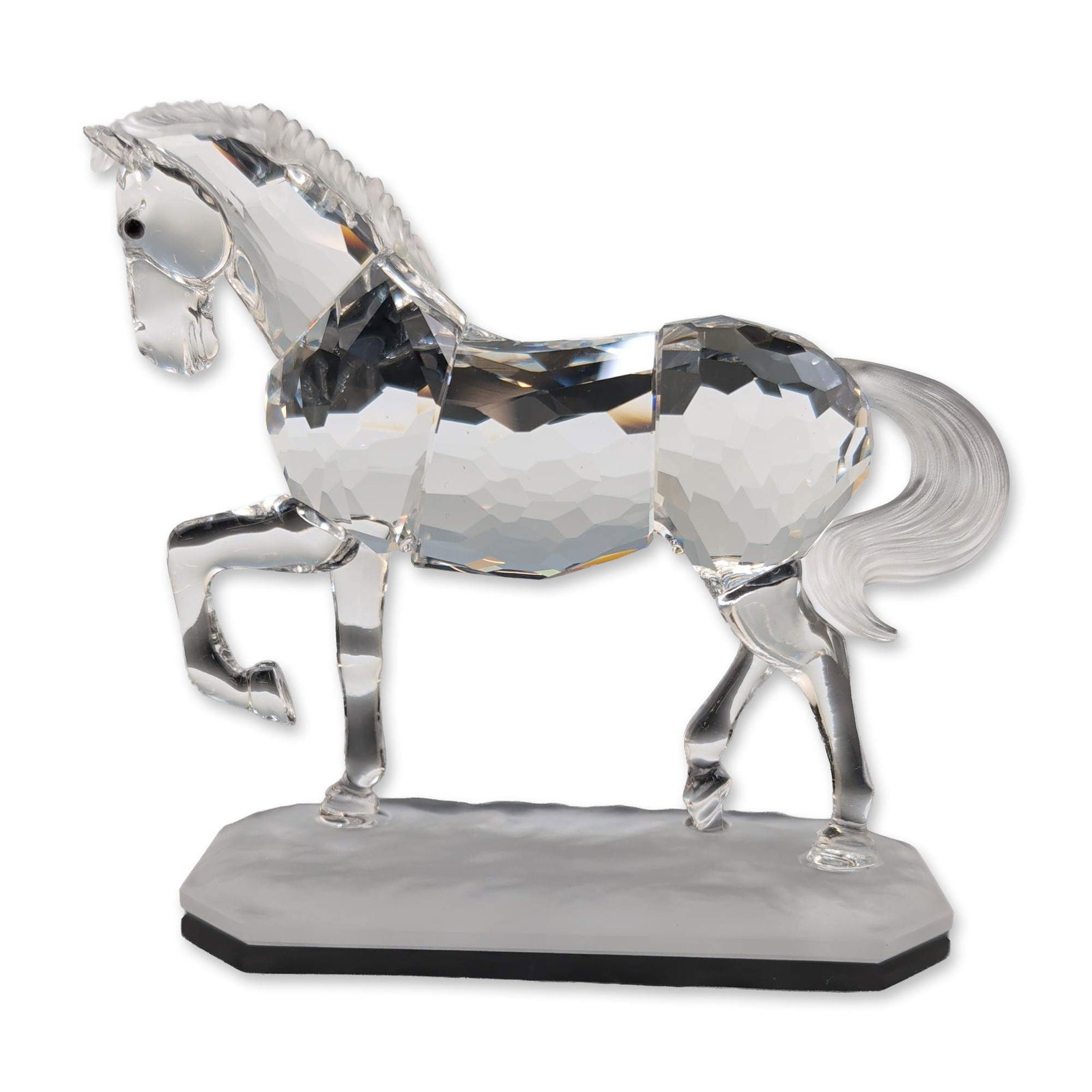 Swarovski Silver Crystal Figurine, Arabian Stallion: Swarovski Silver Crystal figurine of an Arabian stallion designed by Martin Zendron. It is constructed from faceted clear lead crystal with a frosted mane and tail, depicted in a rearing pose on an ir