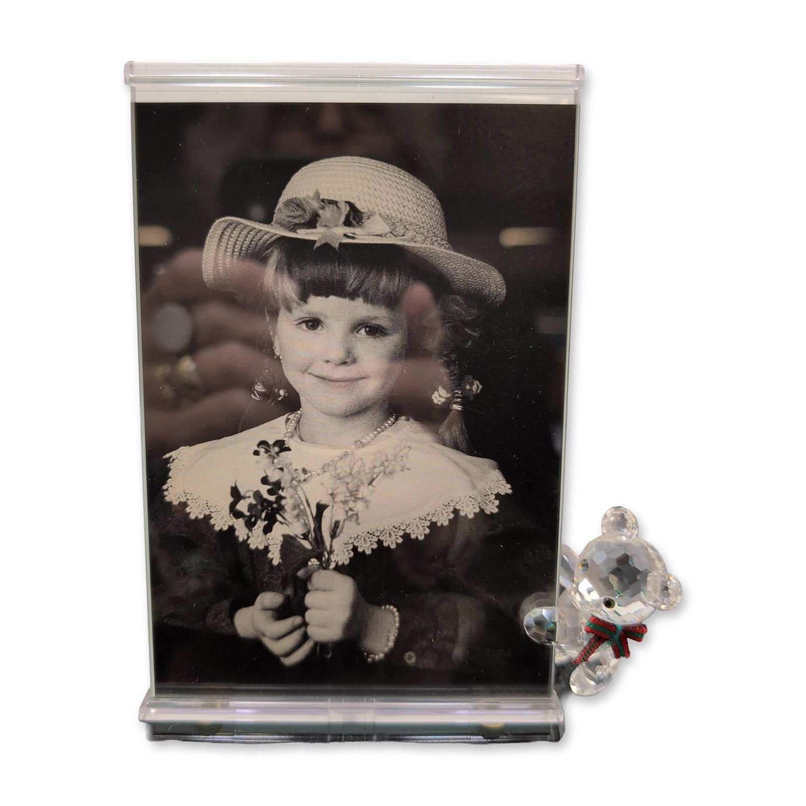 Swarovski Silver Crystal Picture Frame, Kris Bear: Swarovski Silver Crystal Kris Bear picture frame set featuring a faceted lead crystal bear figurine. Kris Bear is holding the picture frame and wearing a red and green striped scarf around his neck. T