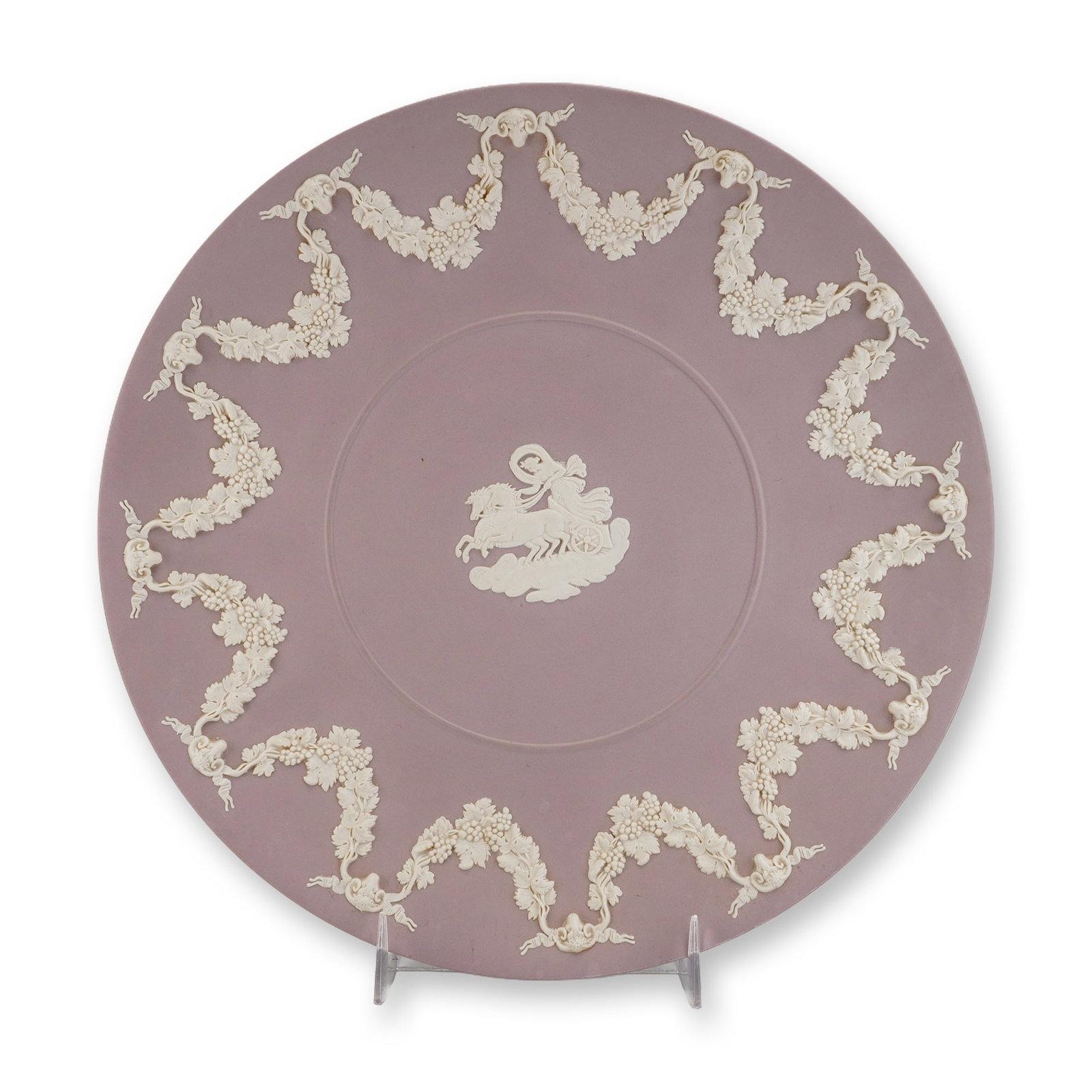 Wedgwood Jasperware Lilac and White Aurora Pattern Cabinet Plate: This piece is constructed from matte-finished stoneware featuring applied white sprigged relief decoration on a lilac ground. The central motif depicts the classical figure of Aurora in a horse-drawn 