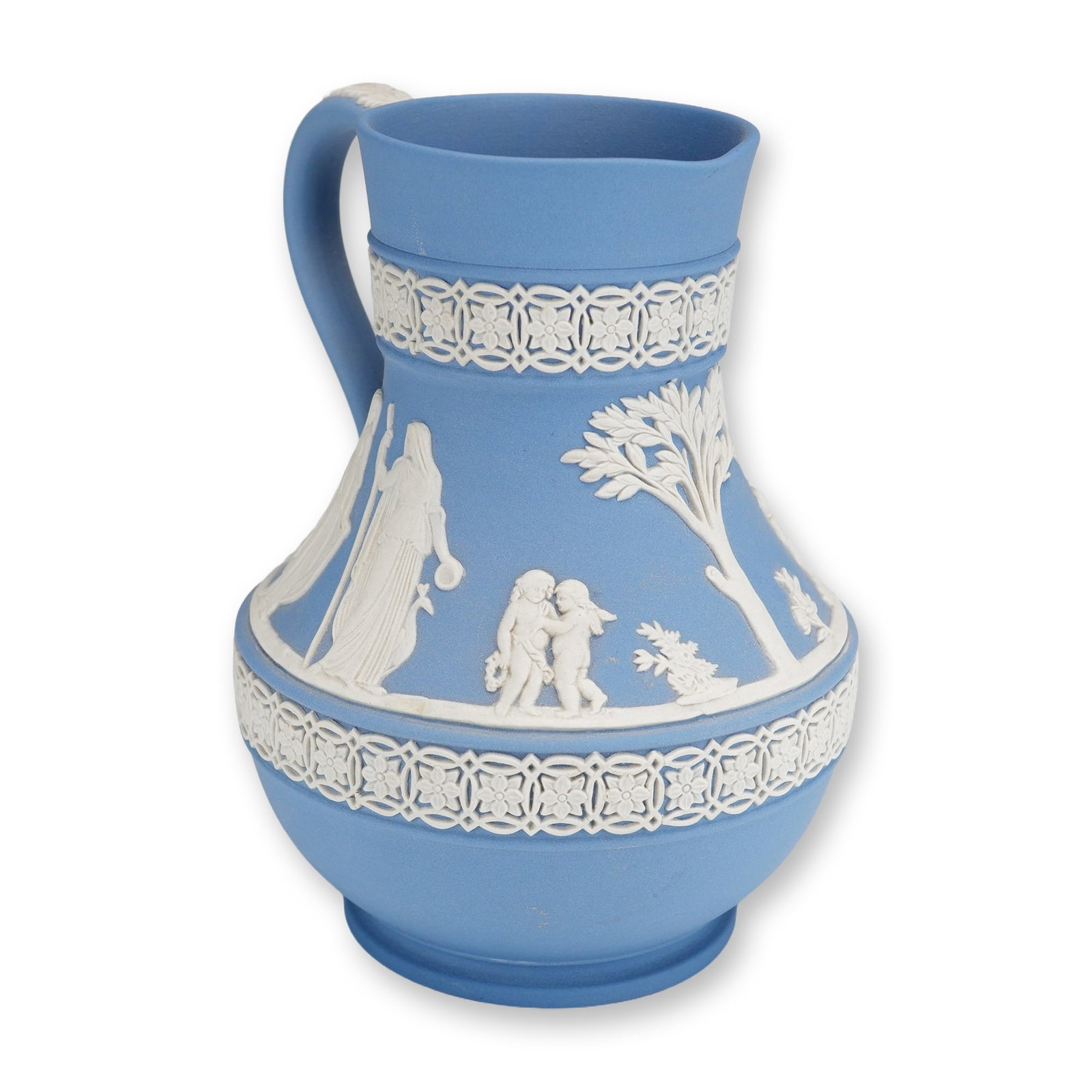Wedgwood Blue Jasperware Neoclassical Pitcher Jug: This Wedgwood jasperware pitcher is a classic example of British stoneware, featuring a neoclassical aesthetic. The small jug has a bulbous body, tapered neck, and a single loop handle with leaf-molde