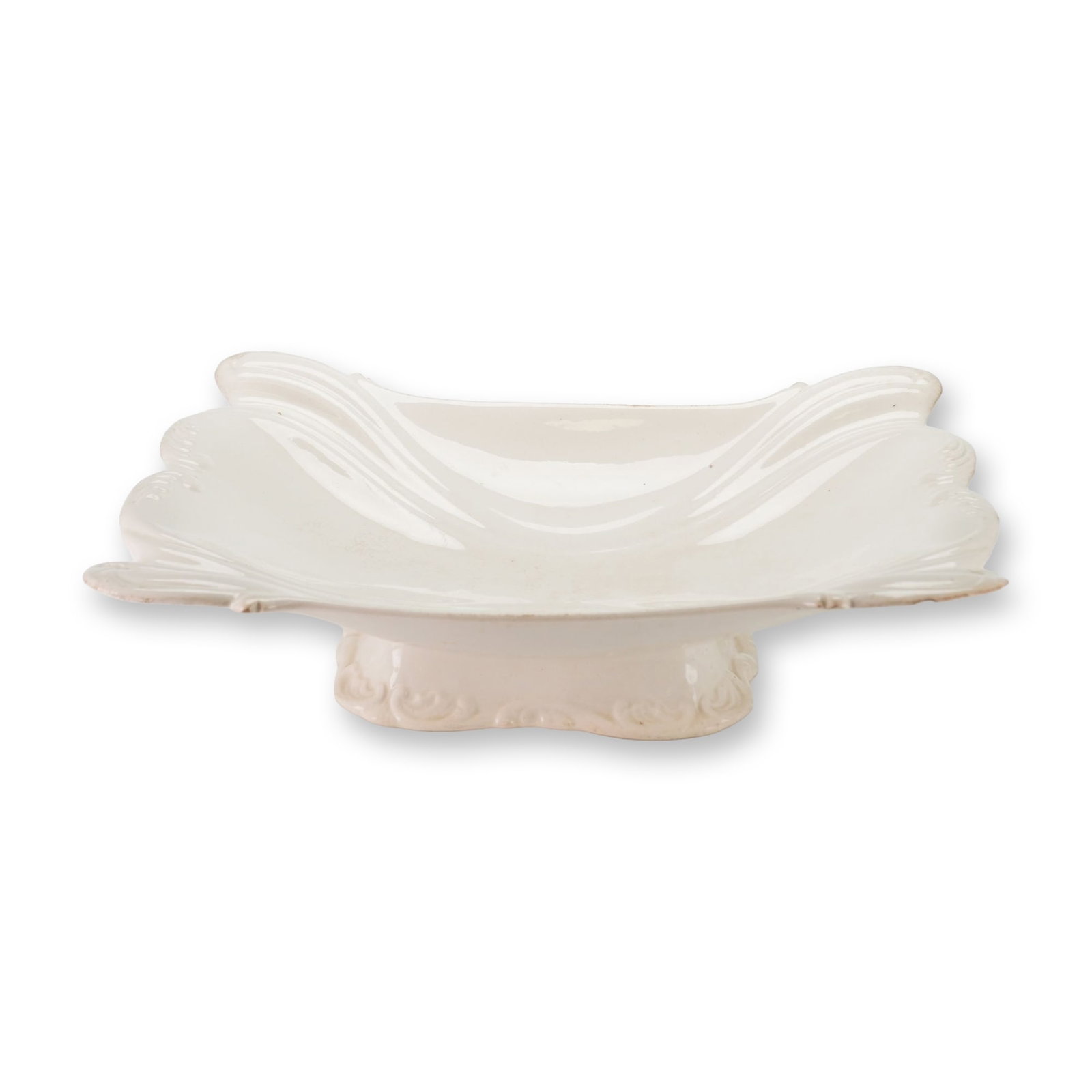 Wedgwood Victorian White Glazed Earthenware Footed Rectangular Dish from the Ellis Rubin Collection: This footed rectangular dish or comport is crafted from glazed earthenware, consistent with mid-19th-century ironstone or creamware production. The object features a wide, flared rim with a scalloped,