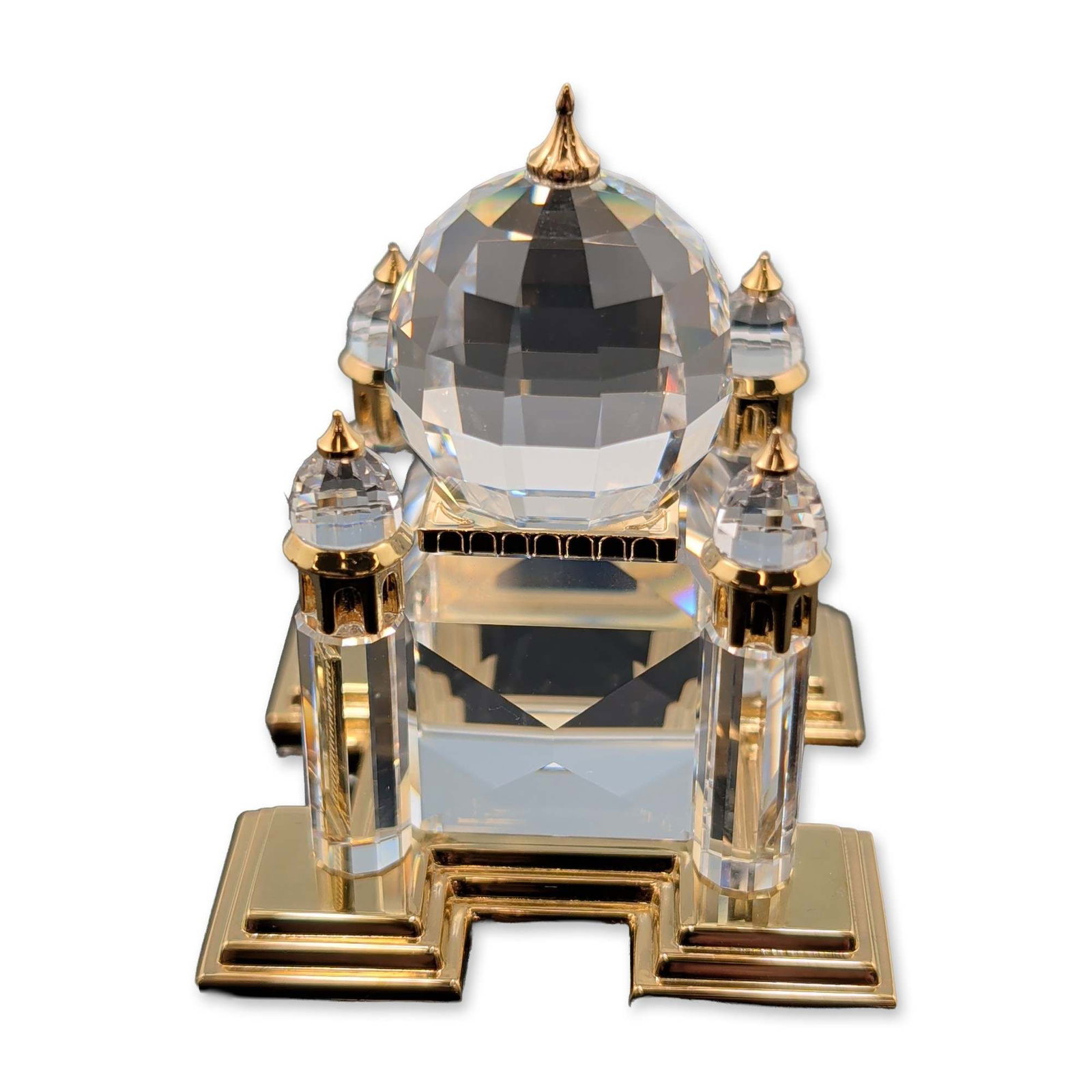 Swarovski Crystal Travel Memories Figurine, Taj Mahal: Taj Mahal model in faceted lead crystal and gold-tone metal, from the Crystal Architecture series. The architectural figurine features a central multi-faceted crystal dome with a gold-tone finial, sur
