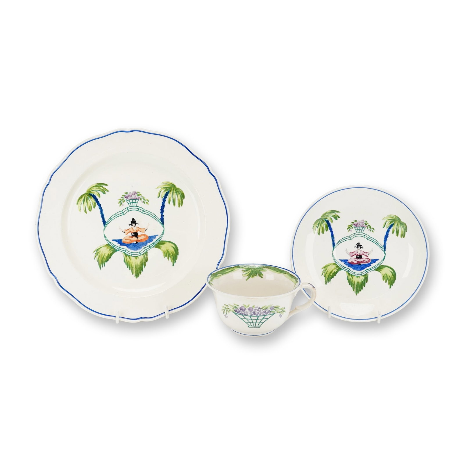 A Trio of Wedgwood Pagodine Pattern Chinoiserie Earthenware: This three-piece earthenware set features the Pagodine pattern produced by Wedgwood at the Etruria works in England. The set consists of a luncheon plate with a scalloped rim, a teacup with a loop han