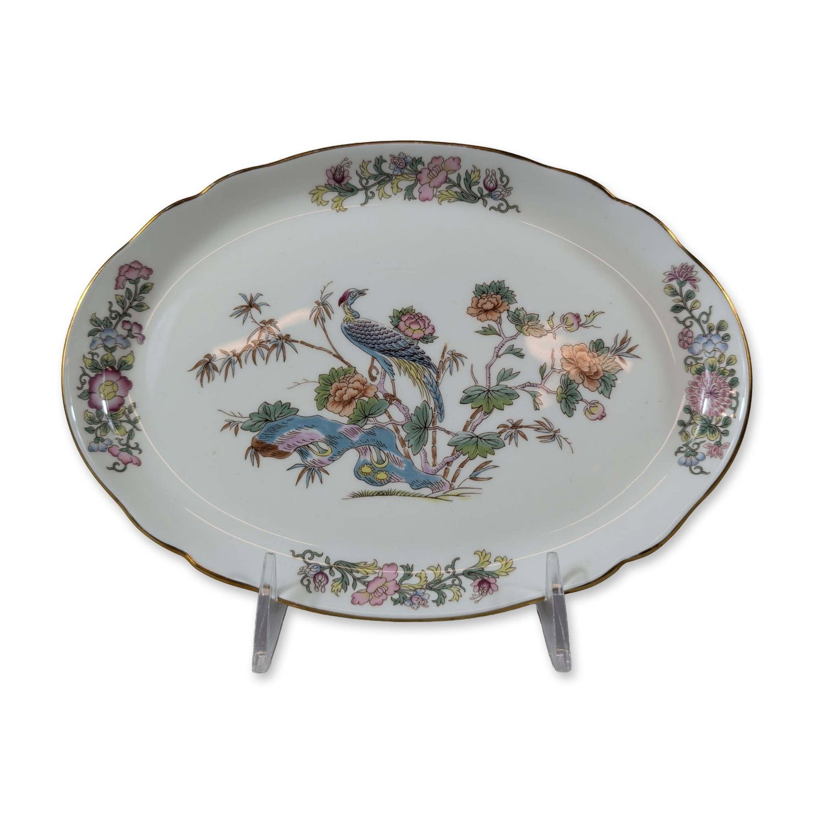 Wedgwood England Bone China Oval Dish, Kutani Crane: Wedgwood, England. Oval dish in bone china, featuring the Kutani Crane pattern executed in polychrome transfer print with hand-painted enamel highlights. The design depicts a central crane among