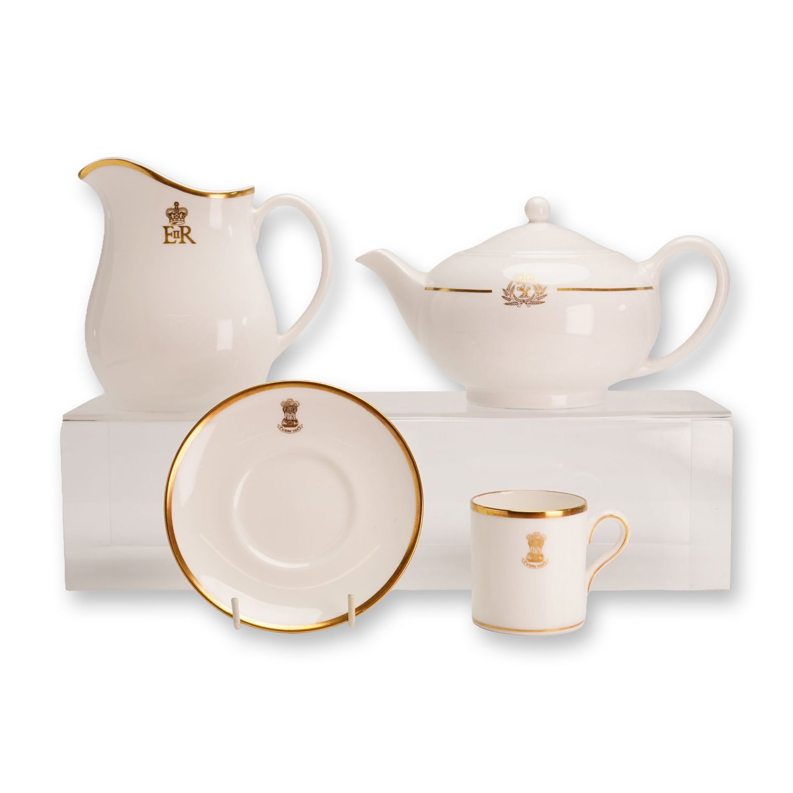 4pc Wedgwood Bone China Collection Including Queen Elizabeth II Coronation Creamer and Cunard Line: This 4pc collection of Wedgwood bone china in the California pattern features a white ground with gilded rims and specific commemorative emblems. The set consists of one cup, one saucer, one creamer,