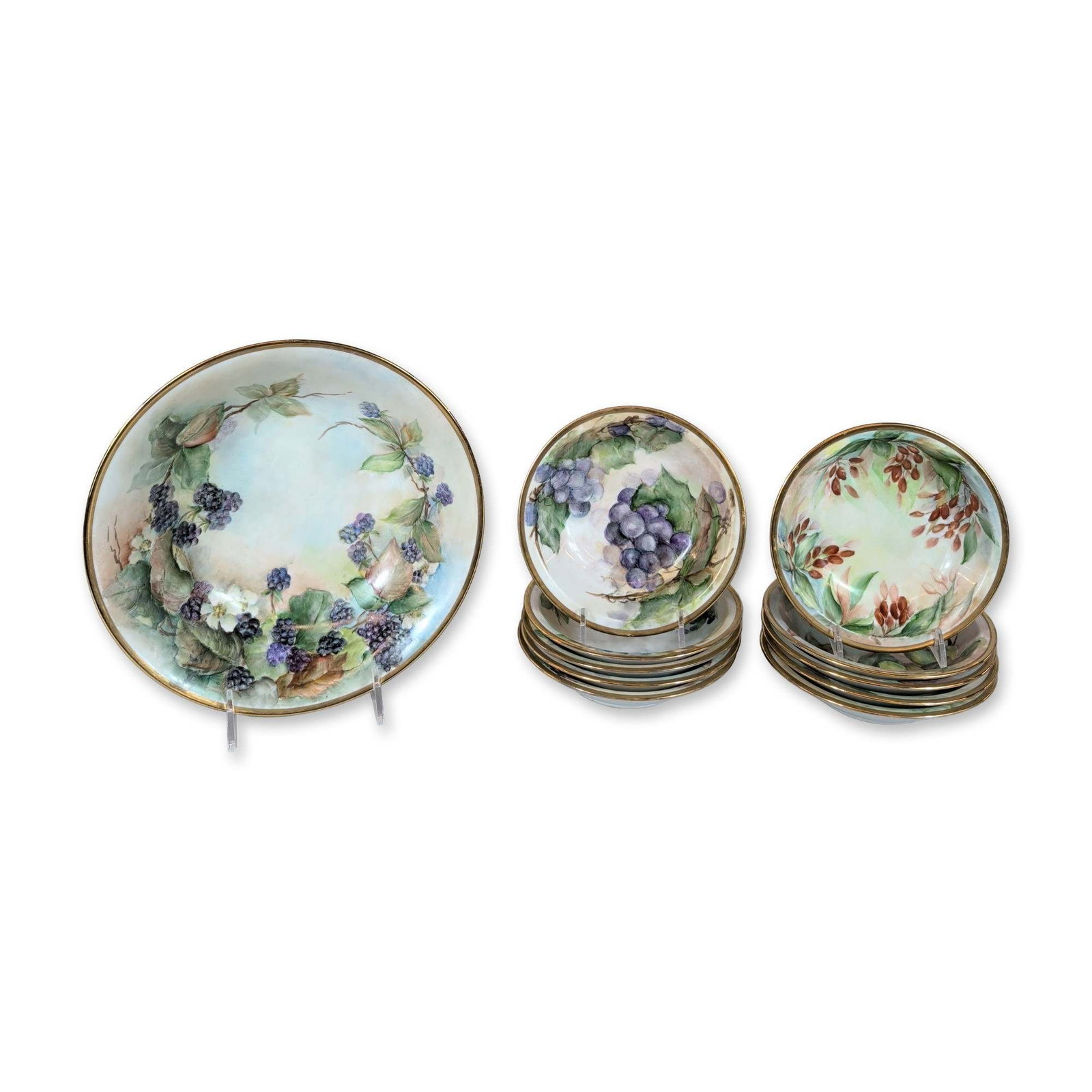 11pc Schonwald Bavaria Hand-Painted Porcelain Dessert Service: Porzellanfabrik Schonwald, Bavaria. Hand-painted porcelain dessert or fruit service featuring varied botanical motifs including blackberries, grapes, plums, cherries, currants, and gooseberries set ag