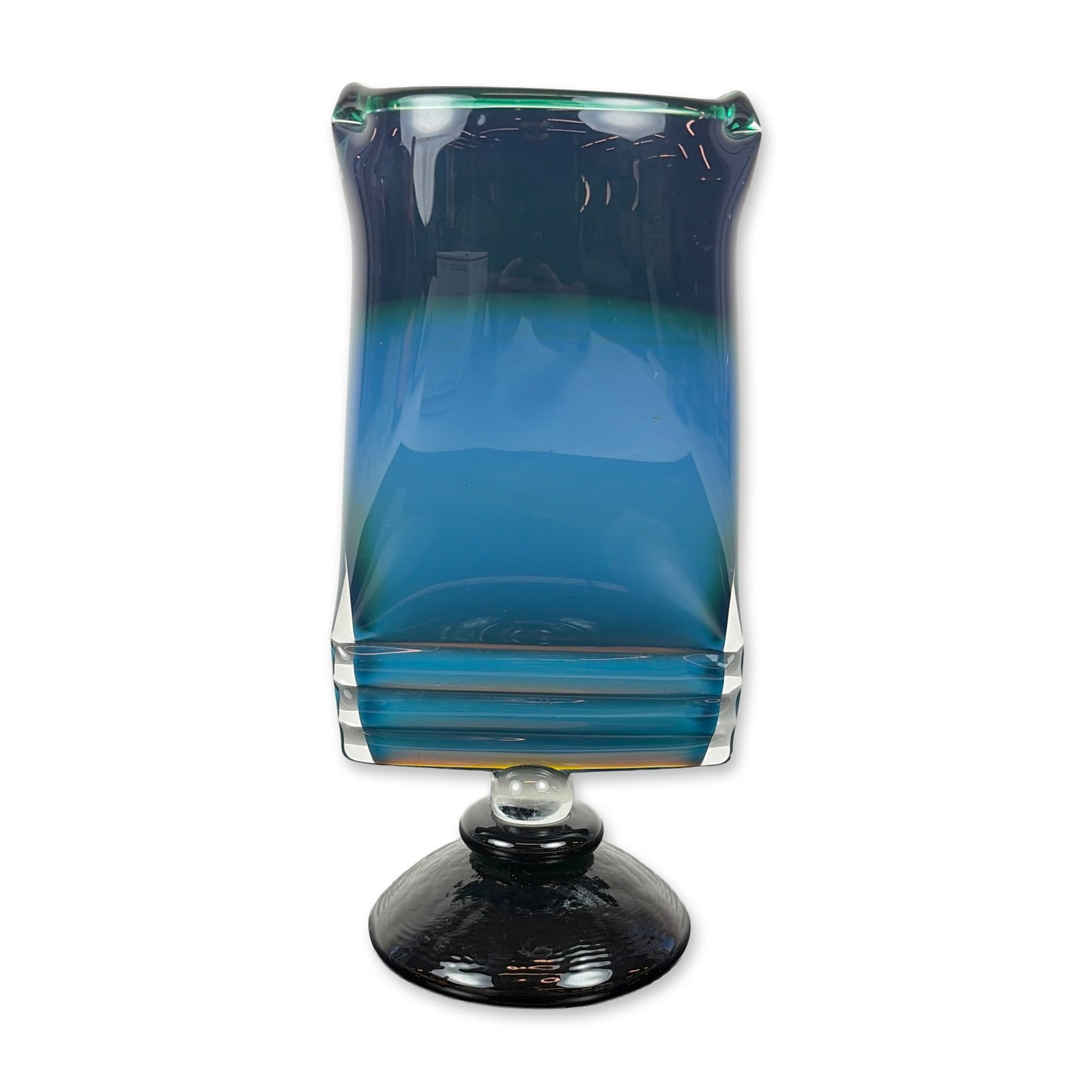 Peter Secrest American Studio Glass Vase 1990: Peter Secrest contemporary studio art glass vase in hand-blown and cased glass, dated 1990. The design features a heavy geometric block form with internal coloration transitioning from teal green to c
