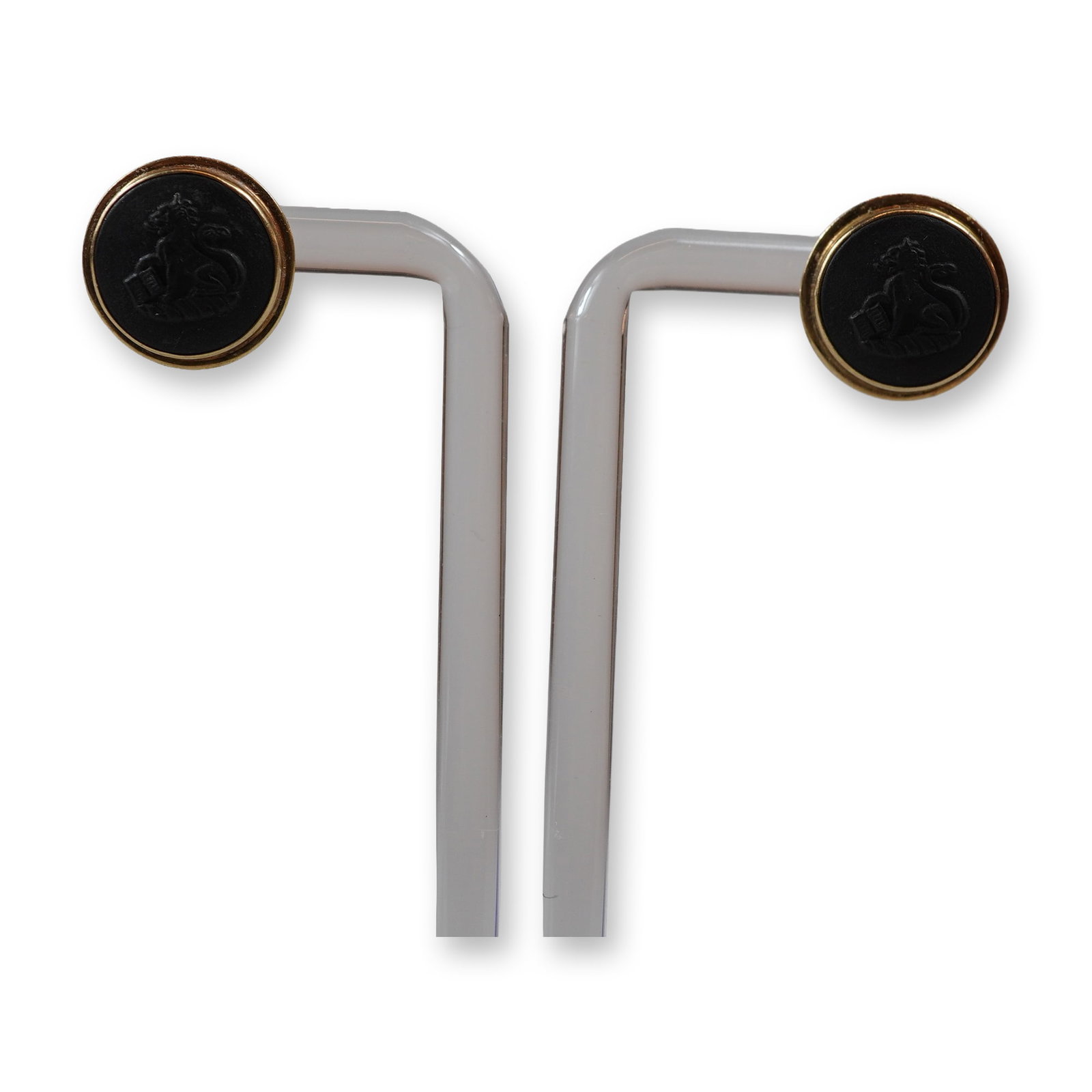 A Pair of Wedgwood Black Basalt and 14K Yellow Gold Heraldic Crest Earrings: A matched pair of vintage stud earrings for pierced ears. Each earring is set with a circular black basalt cabochon produced by Wedgwood, featuring a molded relief cameo of a heraldic crest. The motif