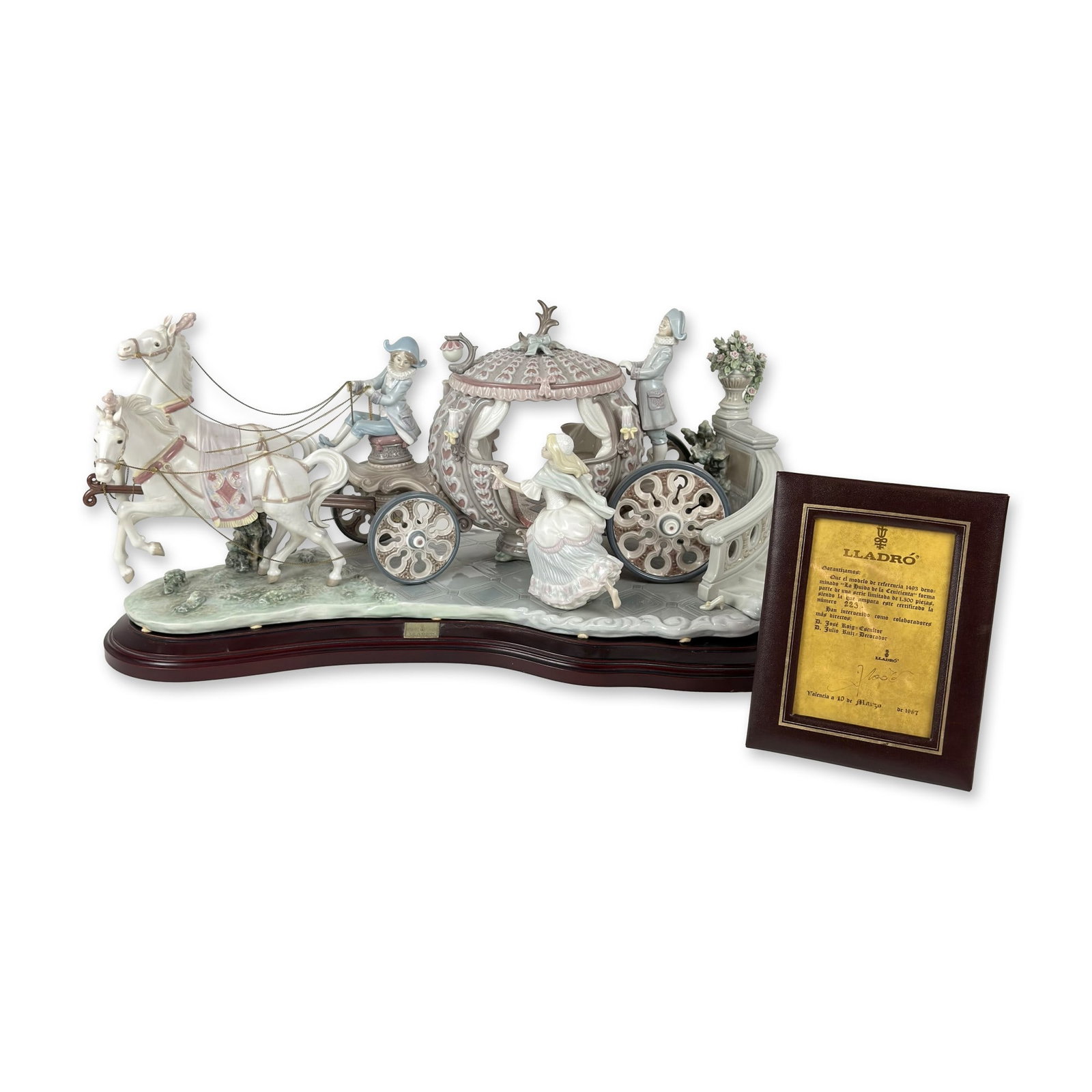 Lladro At the Stroke of Twelve Porcelain Figural Group Sculpture 1001493 with Base/Coa: Limited edition glazed porcelain figural group titled At the Stroke of Twelve (La Huida de la Cenicienta), model number 1493. The sculpture depicts the moment Cinderella flees her ornate pumpkin-style