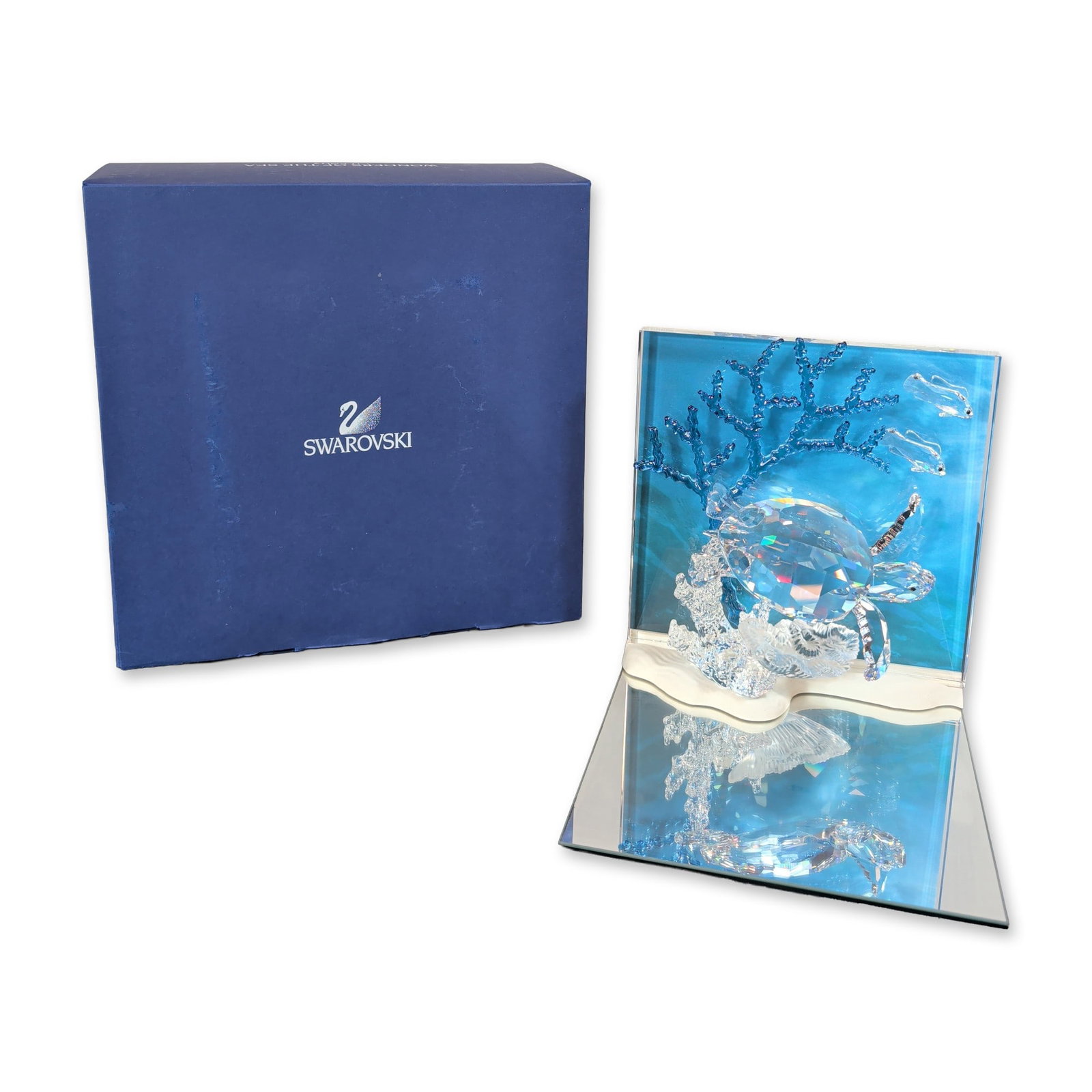 Swarovski Wonders of the Sea Eternity Figurine: Swarovski. 2006 Annual Edition Eternity figurine from the Wonders of the Sea trilogy, crafted in faceted lead crystal. The sculpture depicts a sea turtle with a faceted shell swimming above clear crys