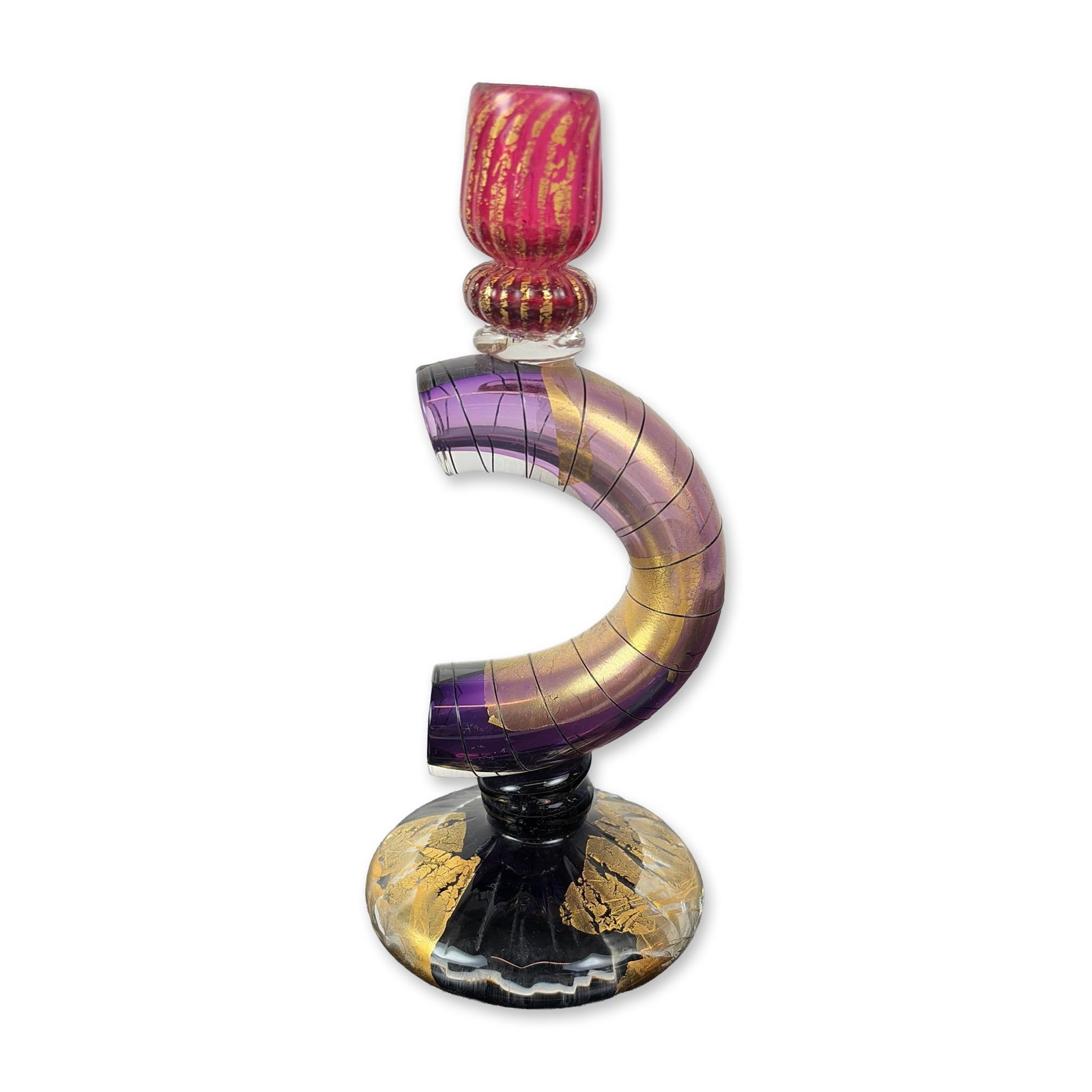David Garcia Hand-Blown Studio Glass Candlestick: Hand-blown studio glass sculptural candlestick composed of multiple assembled components. The piece features a circular glass base infused with gold leaf, supporting a central pedestal and a U-shaped 