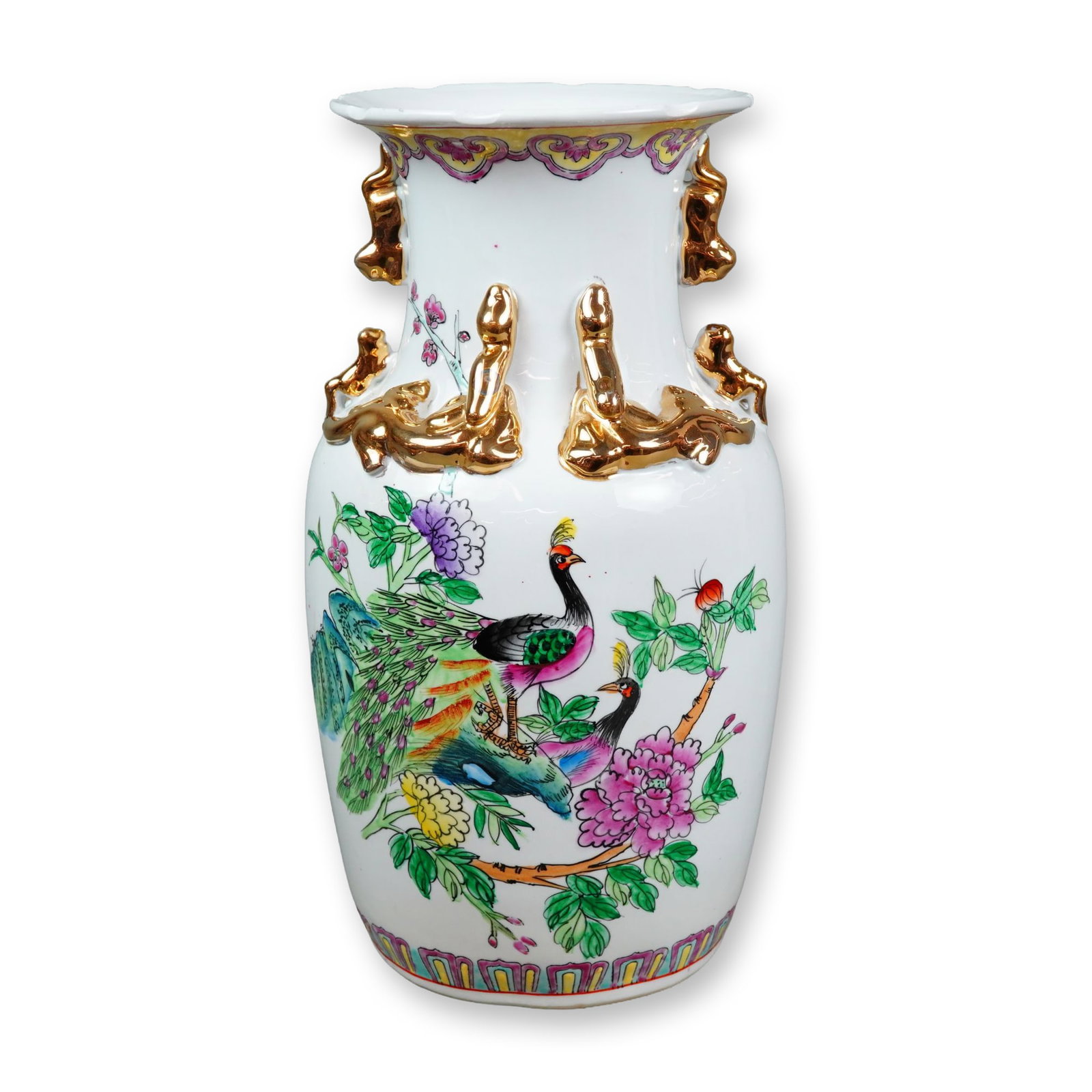 Chinese Famille Rose Porcelain Baluster Vase: 20th century Chinese porcelain baluster-form vase decorated in the Famille Rose style with polychrome enamels. The primary facade depicts a pair of peacocks perched among flowering peony and plum blos