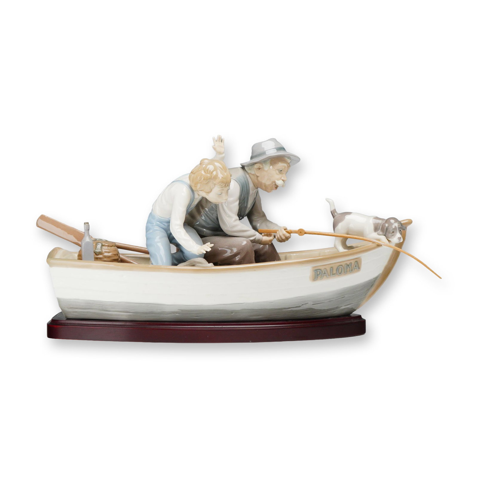 Lladro Fishing with Gramps Porcelain Figurine 5215 with Base: Lladro (Spanish) glazed porcelain figurine titled Fishing with Gramps, model number 5215, sculpted by Jose Puche. The scene depicts an elderly man and a young boy fishing from a rowboat named PALOMA, 