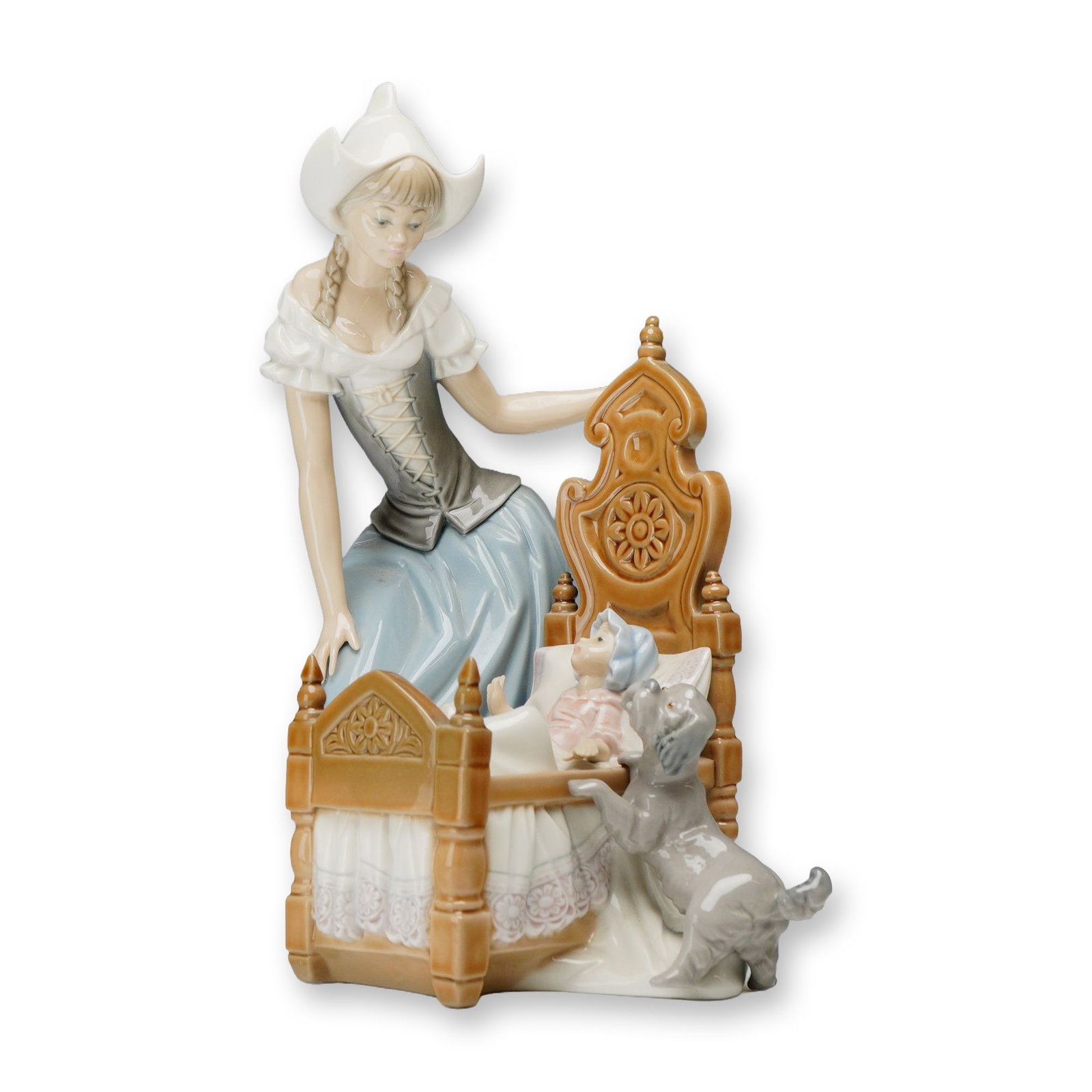 Lladro Dutch Mother Porcelain Figurine: Spanish, Lladro. Figurine in glazed porcelain, model number 5083, titled Dutch Mother. The scene features a young woman in traditional Dutch dress, including a pointed white cap and lace-up bodice, le