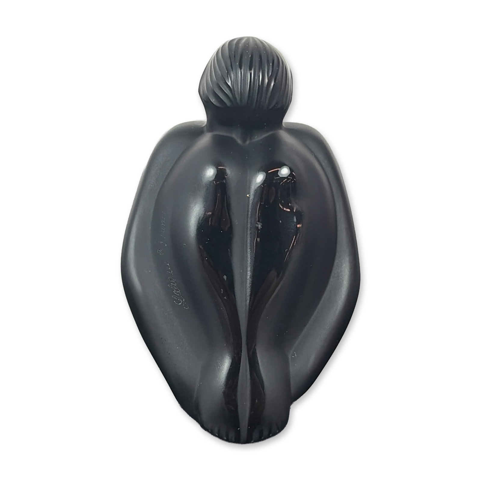 Lalique France Black Crystal Nu Assis Figurine: Lalique France Seated Nude figurine titled Nu Assis in black crystal, featuring a stylized crouching figure form with a combination of matte acid-etched and polished finishes. The head is detailed wit