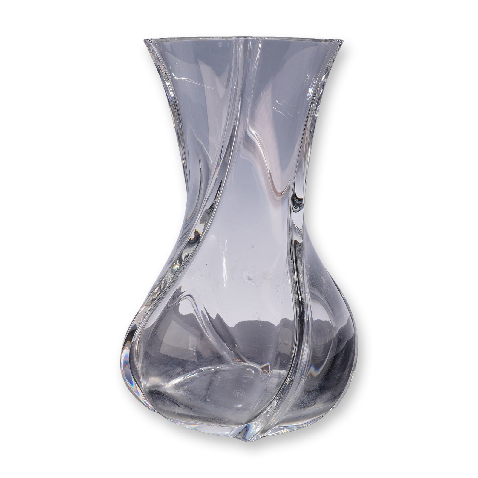 Baccarat Serpentin Clear Crystal Vase: Baccarat (French, founded 1764). Serpentin pattern flower vase in clear lead crystal, featuring a heavy-walled sculptural form with twisted vertical ribbing tapering to a cinched waist and flaring tow