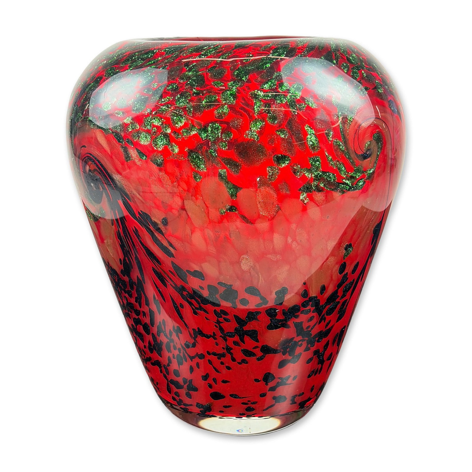 In the Style of Murano Blown Art Glass Sculptural Vase: Hand-blown sculptural vase with a ruby red ground. The rounded end features green and gold aventurine metallic inclusions in a swirling pattern, transitioning to a dense black macchia decoration near 