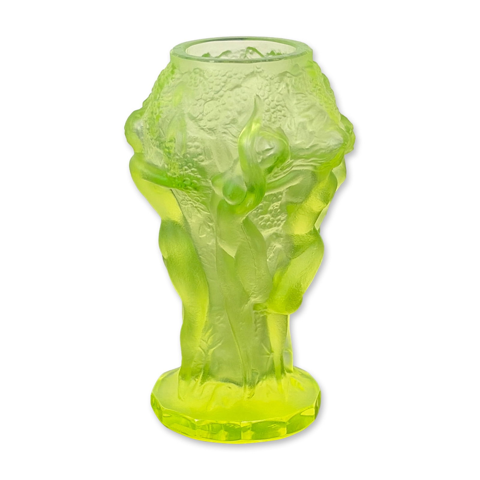 R. Lalique France Uranium Glass Bacchanalia Vase: The semi-translucent yellow-green glass features molded female nudes forming the stem, supporting a flared bowl decorated in high relief with grapes and foliage, resting on a faceted decagonal base. T