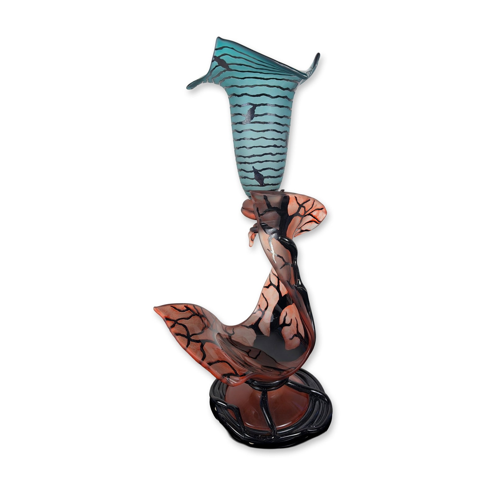 Contemporary Art Glass Sculpture: Features a tapered teal glass horn with horizontal black bands and dark integrated silhouettes. The second component is a flared peach-toned vessel with black branch-like veining, supported by a heavy