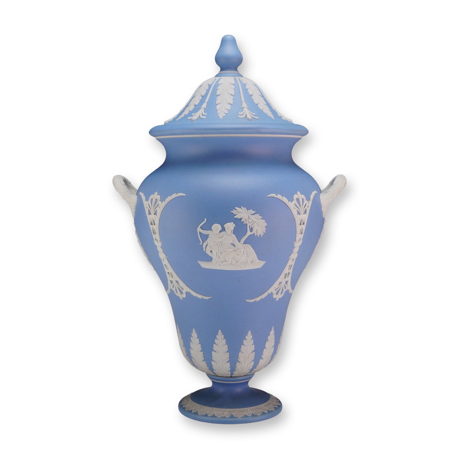 Wedgwood Blue and White Jasperware Lidded Urn: A Wedgwood blue and white Jasperware lidded urn of Neoclassical Campagna form. The piece is crafted from stoneware featuring a matte light blue ground with white sprigged or applied relief decorations