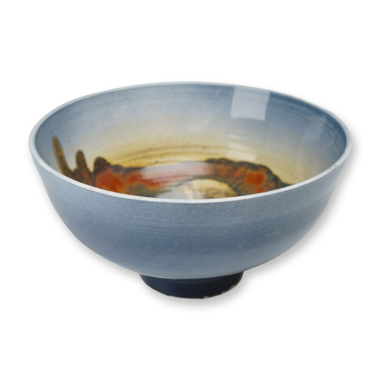 Wedgwood Bone China Footed Bowl with Experimental Studio Glaze: A contemporary footed bone china bowl manufactured by Wedgwood in England. The vessel features a tapered, rounded form on a raised base. The exterior is finished in a semi-matte pale blue glaze charac