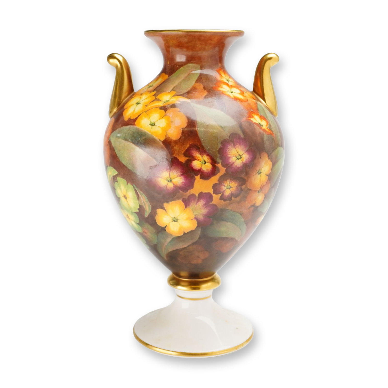 Wedgwood Hand Painted Bone China Floral Urn Vase: A Wedgwood hand painted bone china urn-form vase of ovoid shape. The vessel features a flared rim and two gilded scrolled handles, supported by a white pedestal base with a gilded foot rim. The body i