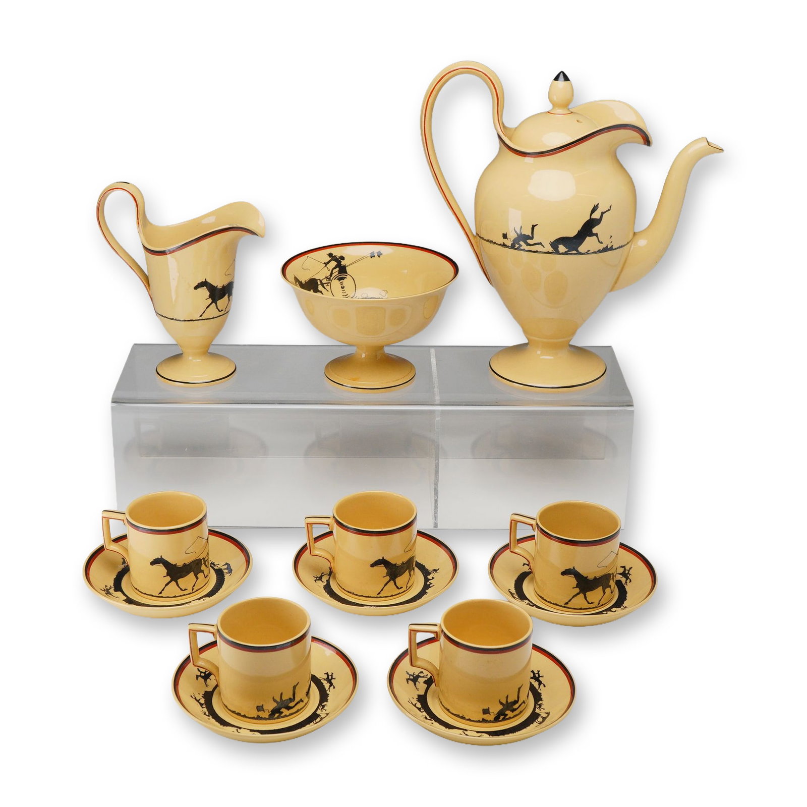 13pc Wedgwood Coffee Service: A 13-piece Art Deco glazed earthenware coffee service produced by Wedgwood in Etruria, England, circa 1930s. The set is made from a buff-toned earthenware body and decorated with black transfer-printe