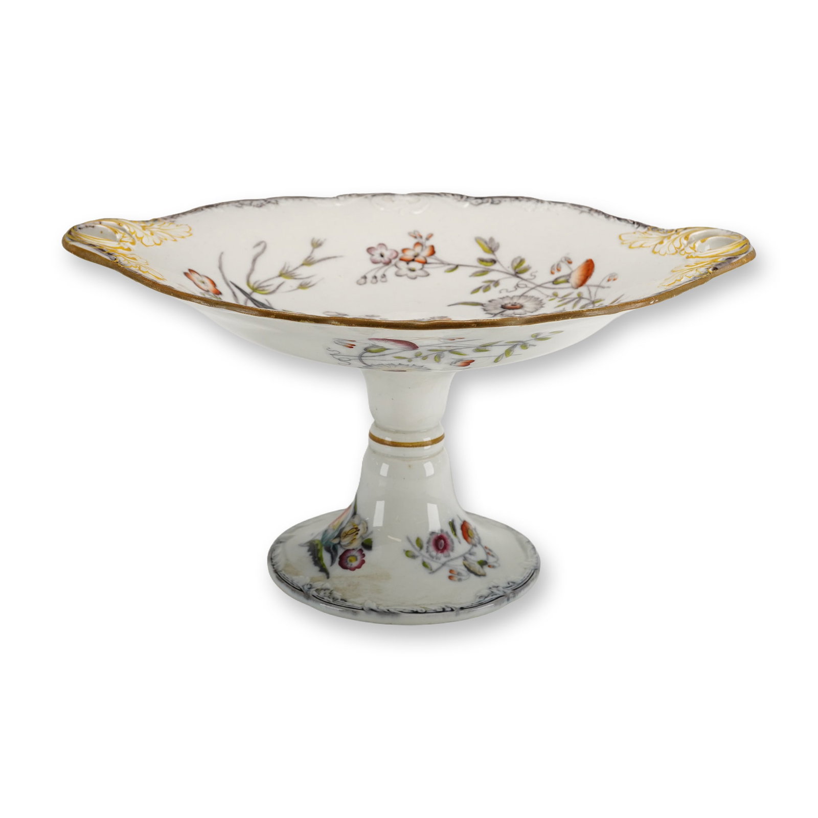 Wedgwood Pearl Ranunculus Compote: This antique Wedgwood Pearlware footed compote is decorated in the vibrant Ranunculus pattern, dating to the mid-19th century, approximately 1840-1868. The form consists of a shallow, circular tazza