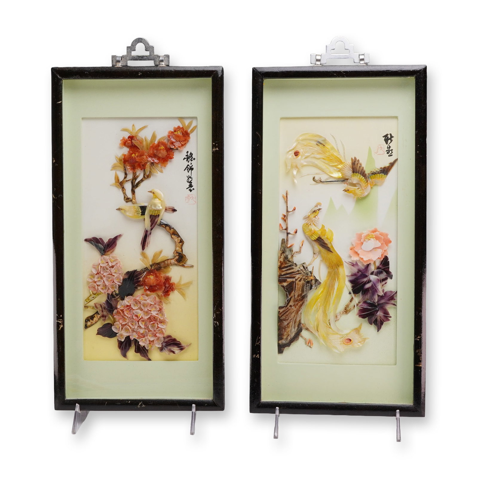 Pair of Chinese Shell Carving Lacquer Shadowbox Dioramas: Chinese export, mid-to-late 20th century. A pair of shell-carving relief panel dioramas housed in black-lacquered wooden shadowbox frames under glass. Each rectangular panel features detailed high-rel