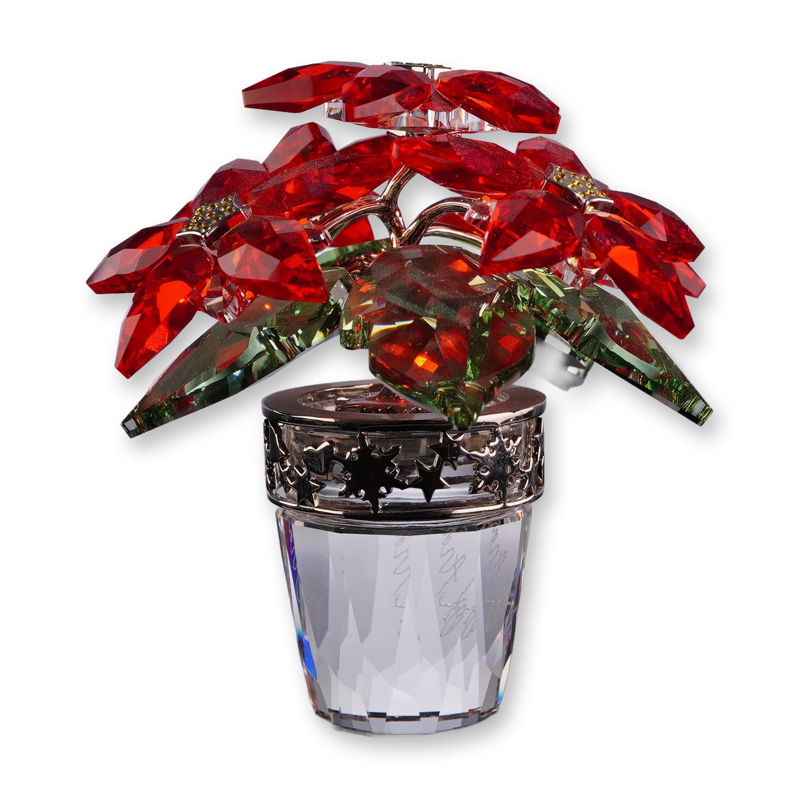 Swarovski Crystal Large Poinsettia Figurine: The piece features three clusters of faceted red crystal flowers with yellow-gold tone crystal centers, supported by polished metal stems and accented with faceted green crystal leaves. The plant is s