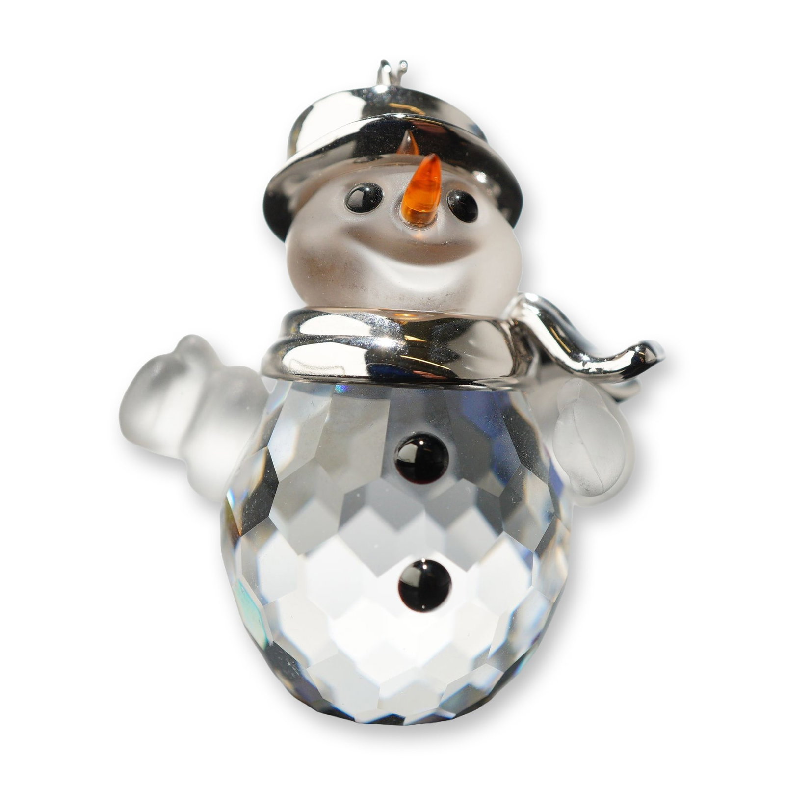 Swarovski Crystal Snowman Figurine Ornament: Swarovski crystal snowman figurine featuring a clear faceted crystal body and frosted glass head and arms. The figure is accented with a polished silver-tone metal top hat and matching scarf. Face is 