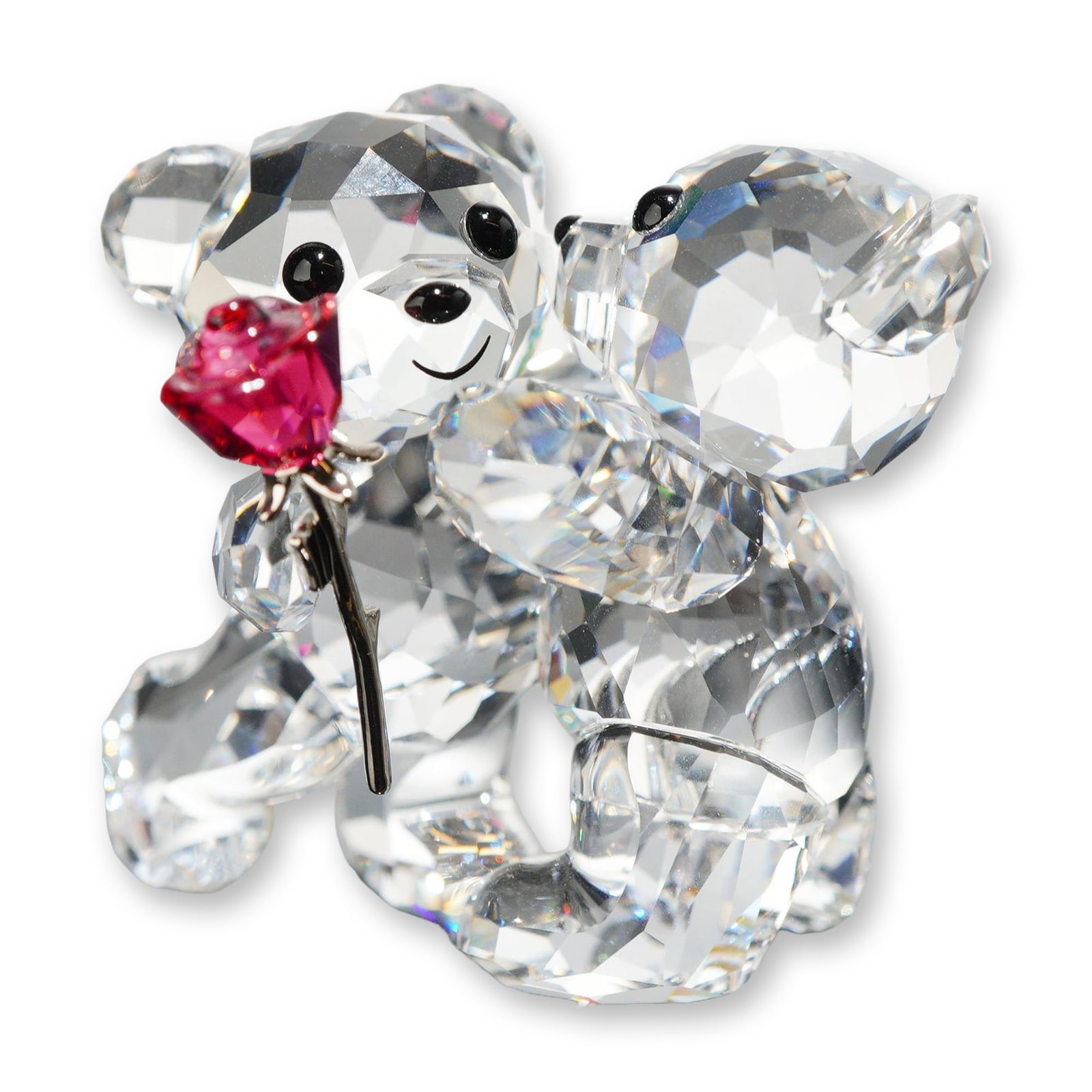 Swarovski Crystal Figurine, Kris Bear A Rose for You: Kris Bear A Rose for You crystal figurine in clear faceted lead crystal, featuring a pair of bears. One bear is depicted holding a red faceted crystal rose with a silver-tone metal stem and leaves. Co