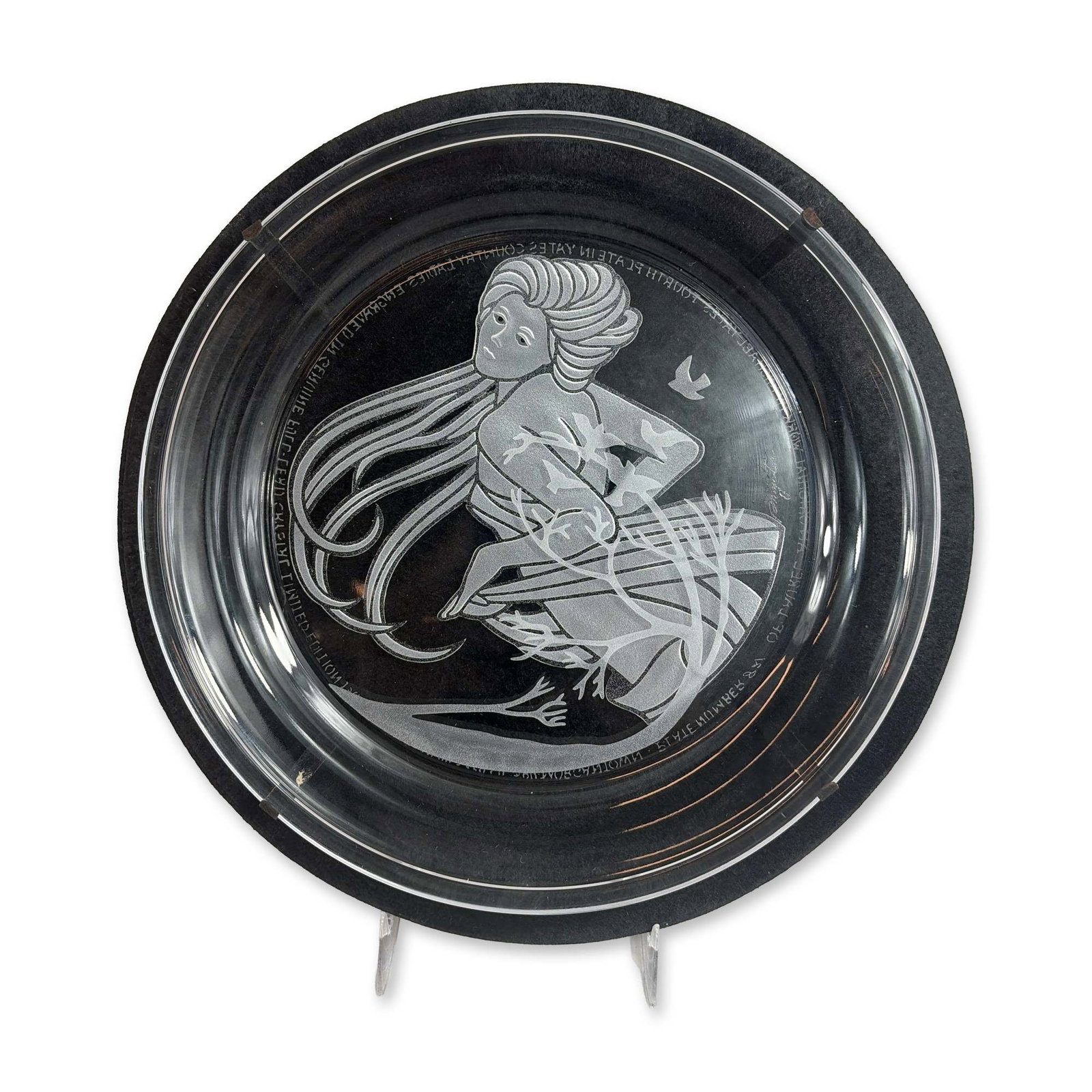 Michael Yates Morgantown Crystal Laurel Plate: Michael Yates for Morgantown Crystal, 1984. Lead crystal intaglio carved plate titled Laurel, representing the fourth issue in the Country Ladies annual series. The frosted central design features a s