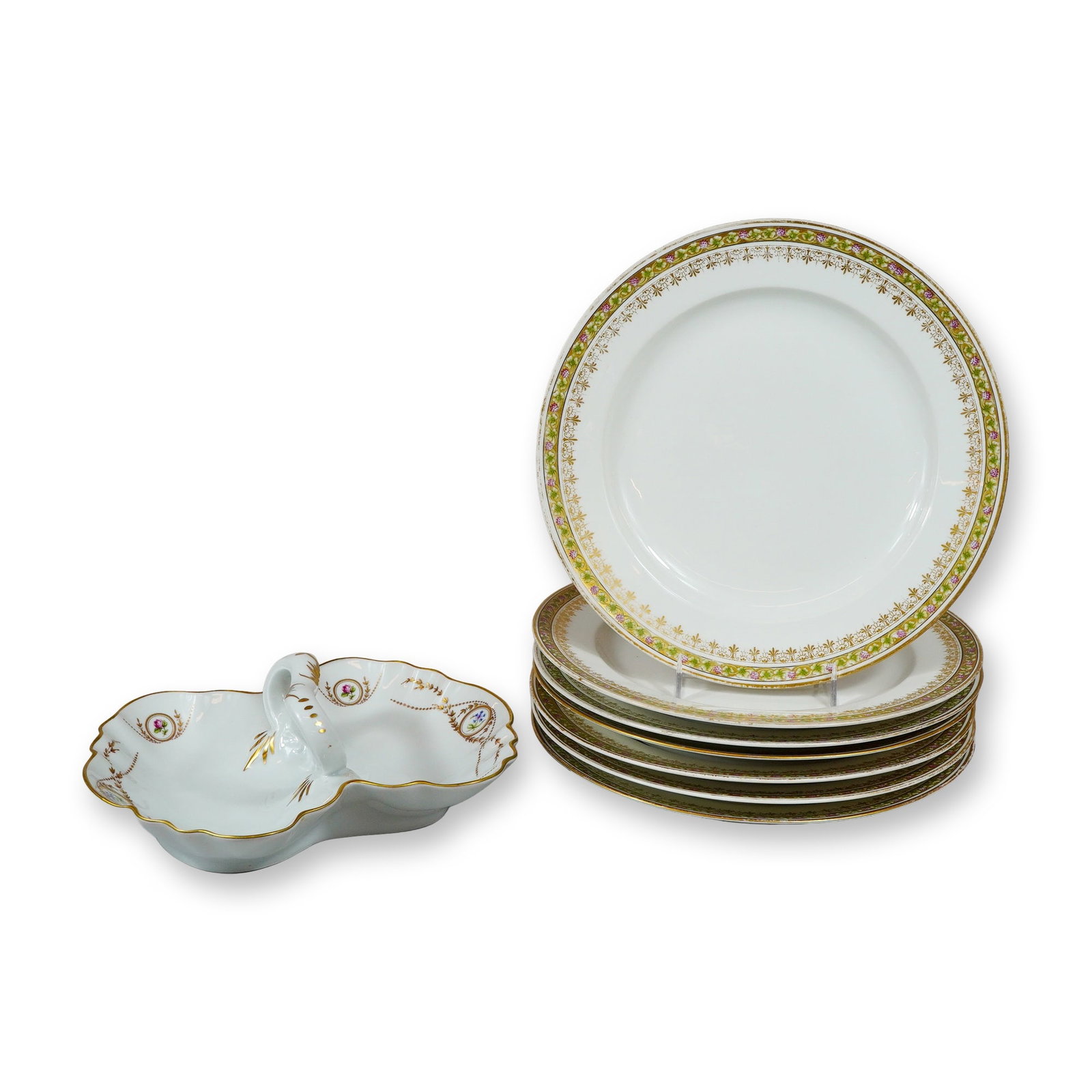 8pc Theodore Haviland Limoges Plates and Split Tray: Theodore Haviland, Limoges, France. Group of seven dinner plates and one split tray with handle, manufactured for the retailer Burley and Company, Chicago. Each piece is crafted from white porcelain. 
