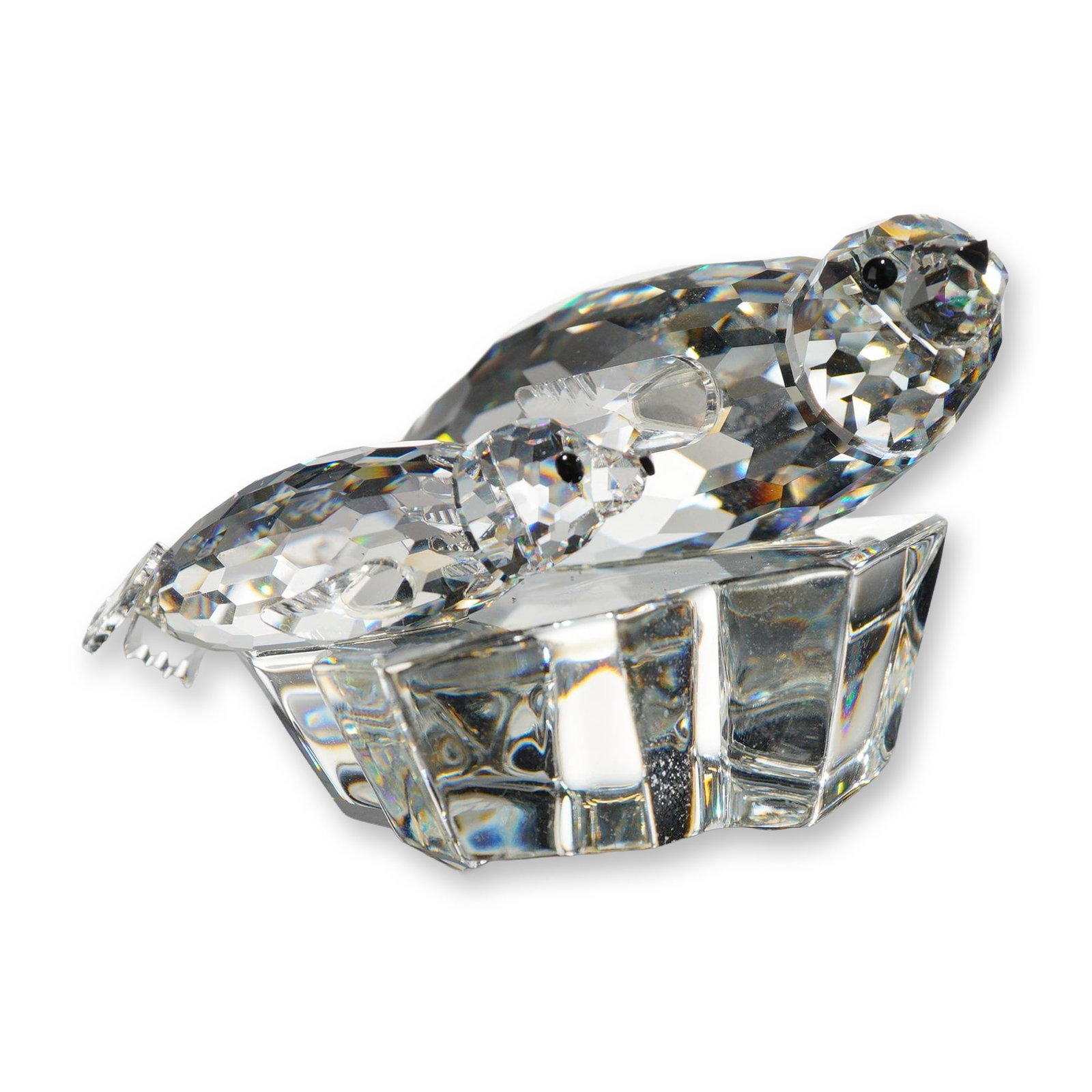 Swarovski 1991 Crystal Save Me Seals Figurine: Swarovski Crystal Society 1991 annual edition figurine, titled Save Me, from the Mother and Child trilogy. Faceted lead crystal model depicting a mother harp seal and her pup resting on a faceted ice 