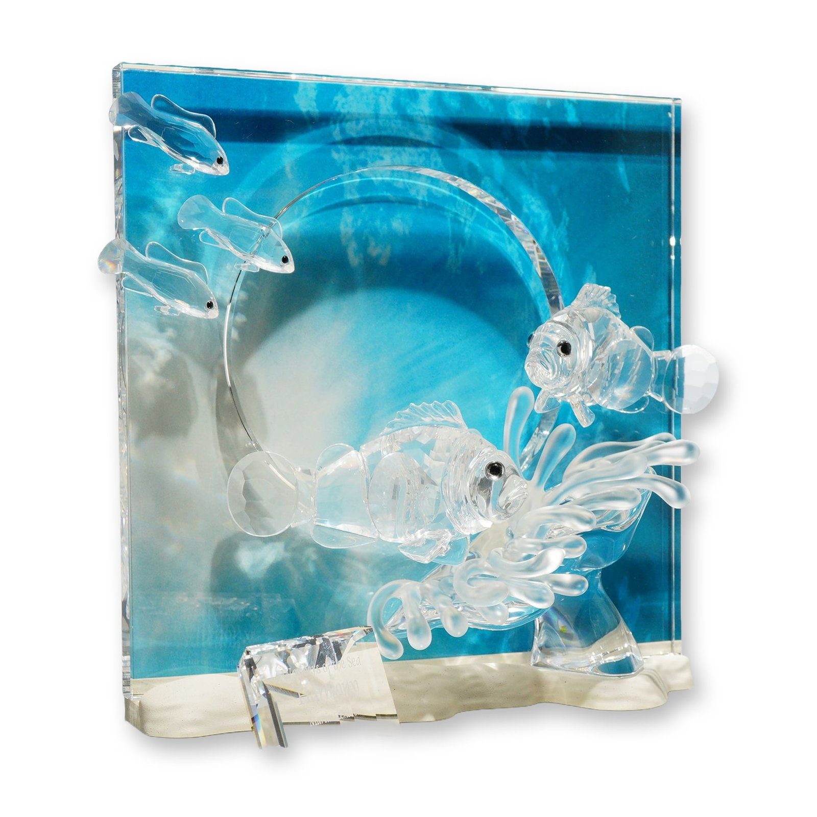 2pc Swarovski 2005 Annual Edition Wonders of the Sea Sculpture, Harmony and Title Plaque: Swarovski. Harmony crystal figurine from the Wonders of the Sea trilogy, designed by Martin Zendron as the 2005 Annual Edition. The composition features two faceted clear crystal clownfish with black 