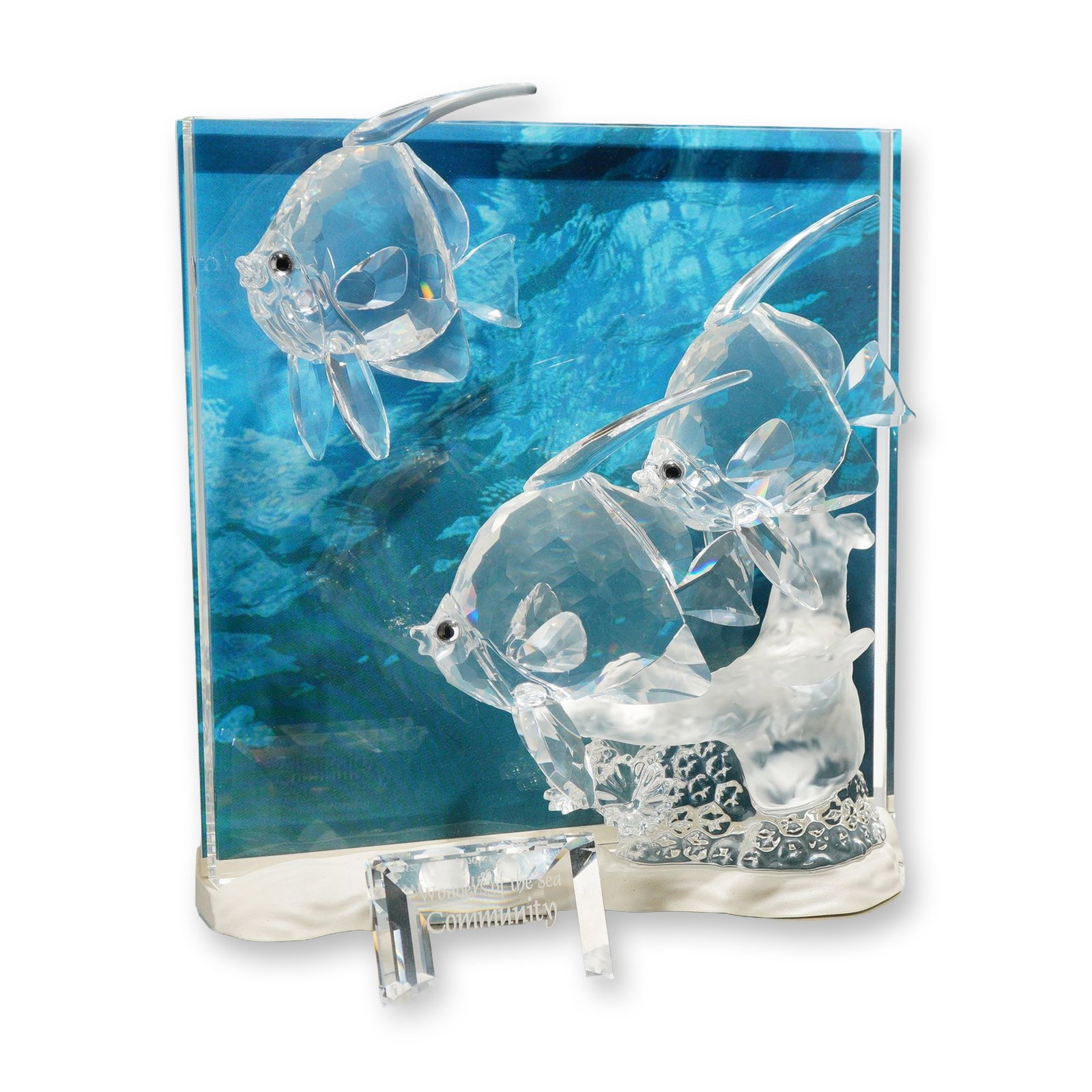 Swarovski Crystal 2007 Annual Edition Wonders of the Sea Sculpture, Community plus Title Plaque: Swarovski crystal figurine titled Wonders of the Sea - Community, designed by Heinz Tabertshofer and released in 2007 as the final edition of the Wonders of the Sea trilogy. The piece features three f