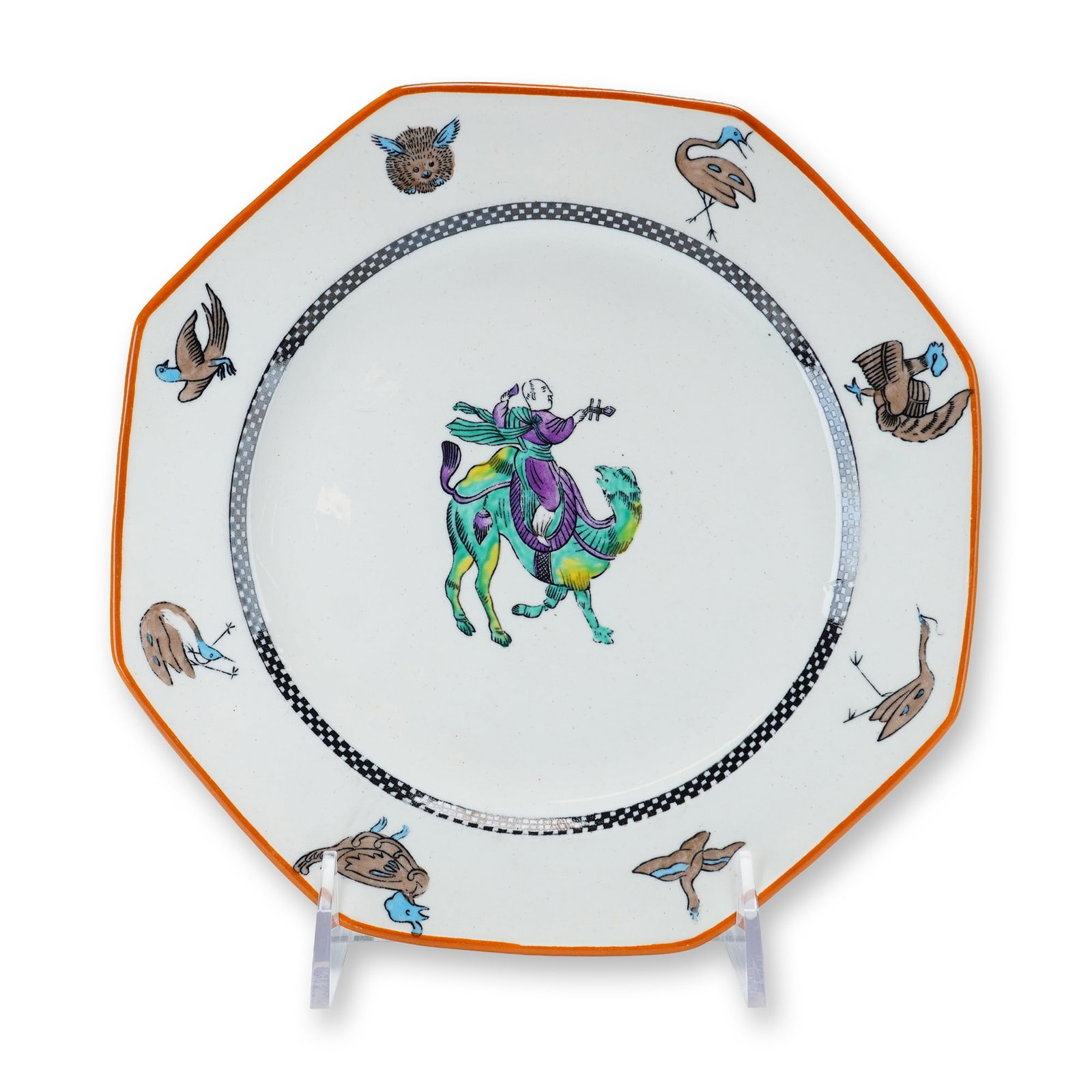 Wedgwood Bone China Octagonal Plate with Chinoiserie Decoration ca. 1914: This Wedgwood bone china octagonal plate dates to approximately 1914. The piece features hand-painted polychrome enamel decoration in a whimsical Chinoiserie style. The central motif depicts a figure 