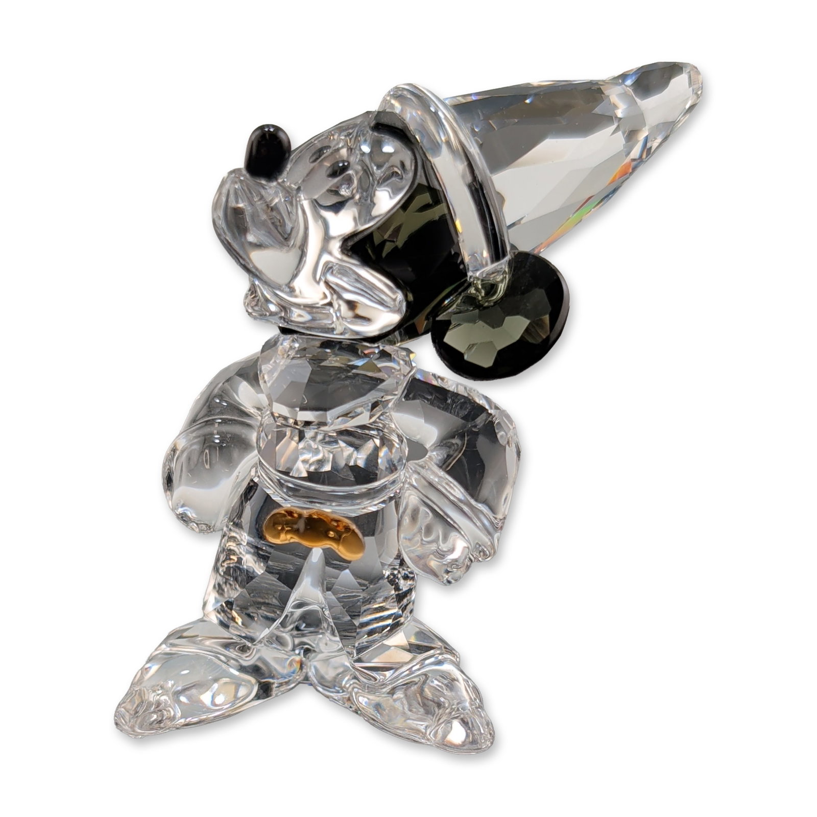 Swarovski Crystal Disney Small Figurine, Sorcerer Mickey Mouse: Swarovski lead crystal figurine depicting Mickey Mouse as the Sorcerer Apprentice from Disney's Fantasia. The figure is rendered in faceted clear and colored crystal, including a pointed sorcerer hat,