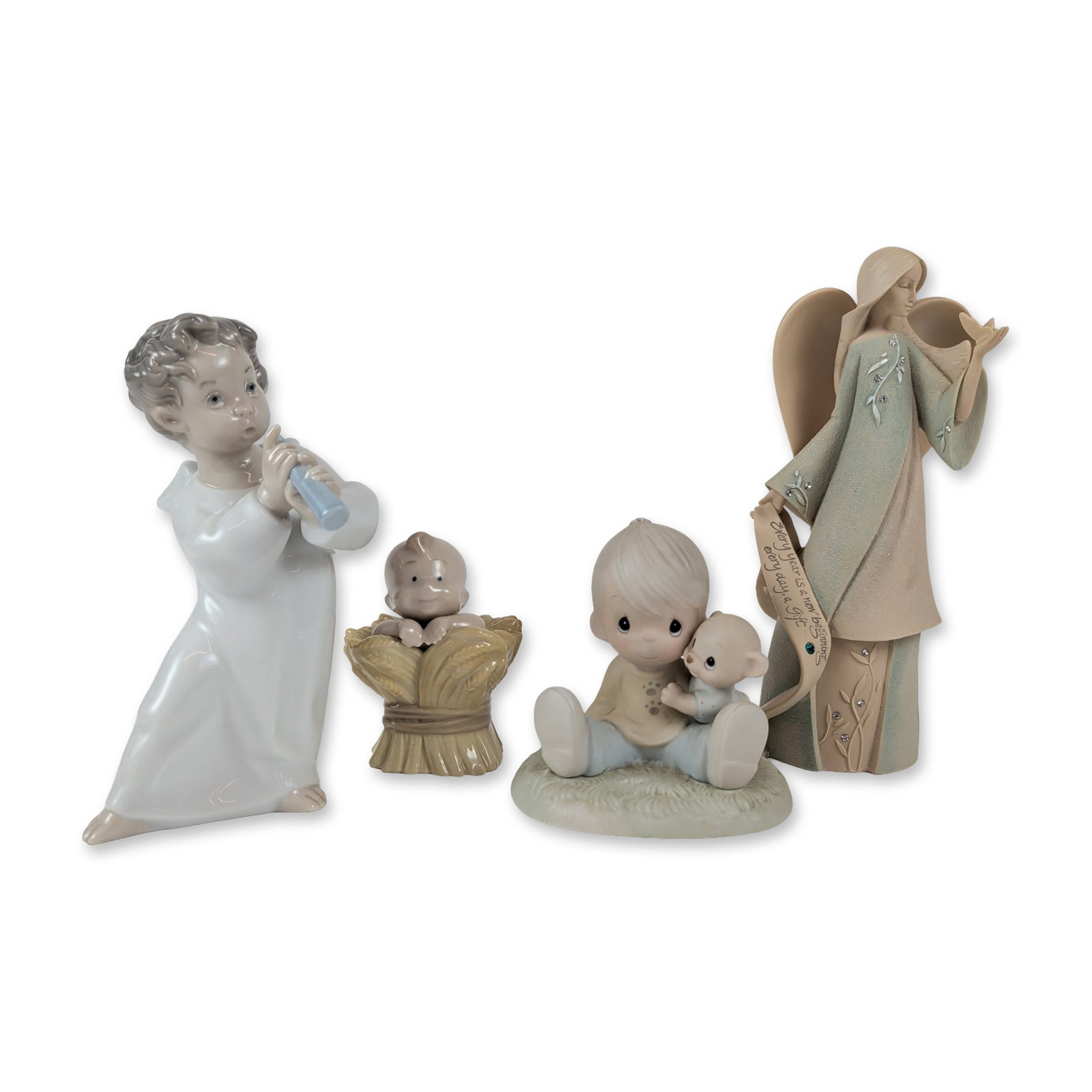 Assortment of Four Lladro, NAO, and Enesco Figurines (1 of 5)