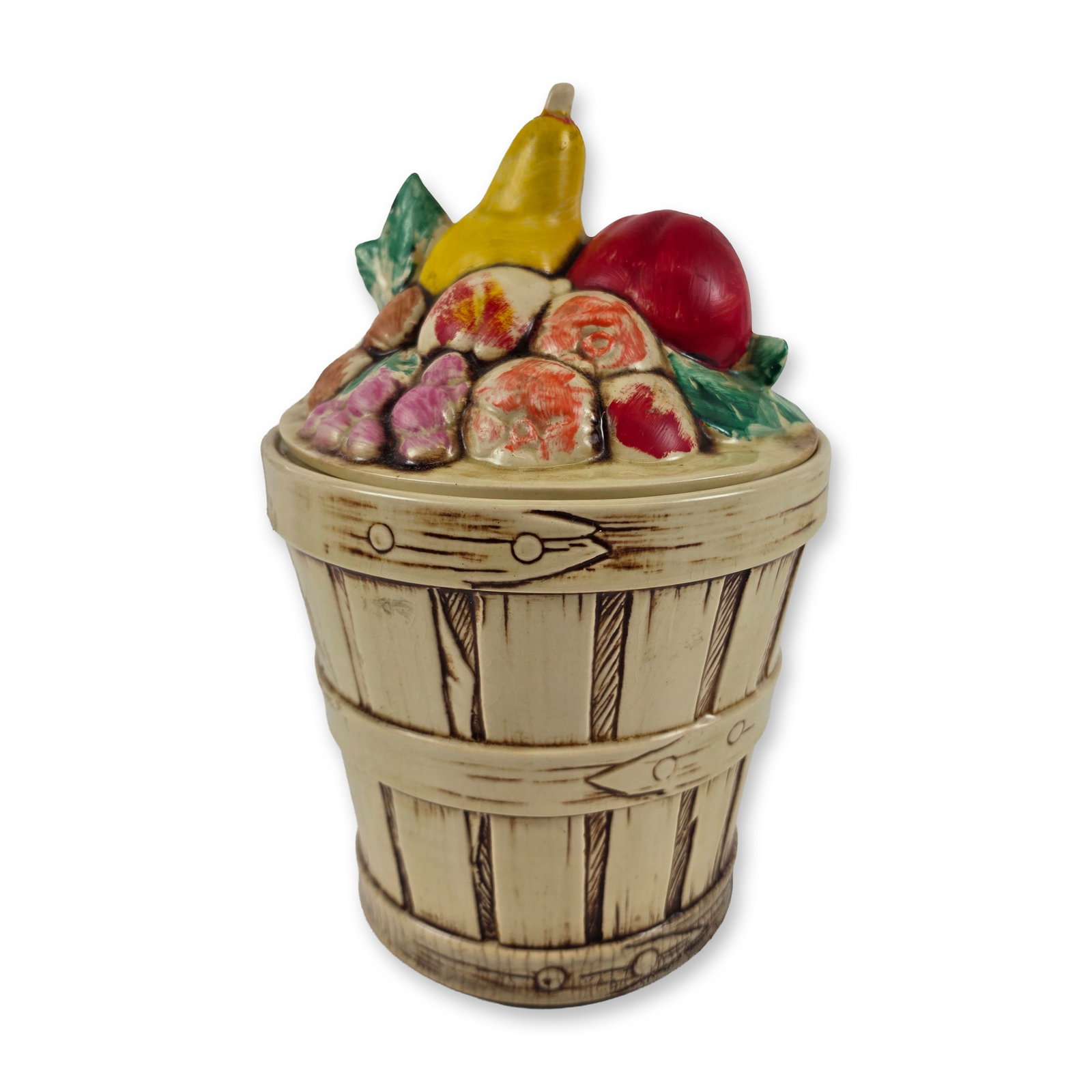McCoy Pottery Ceramic Fruit Basket Jar: Glazed earthenware cookie jar or canister featuring a two-part construction. The base is molded to resemble a wooden stave-built bushel basket with horizontal bands and stylized handles, finished in a