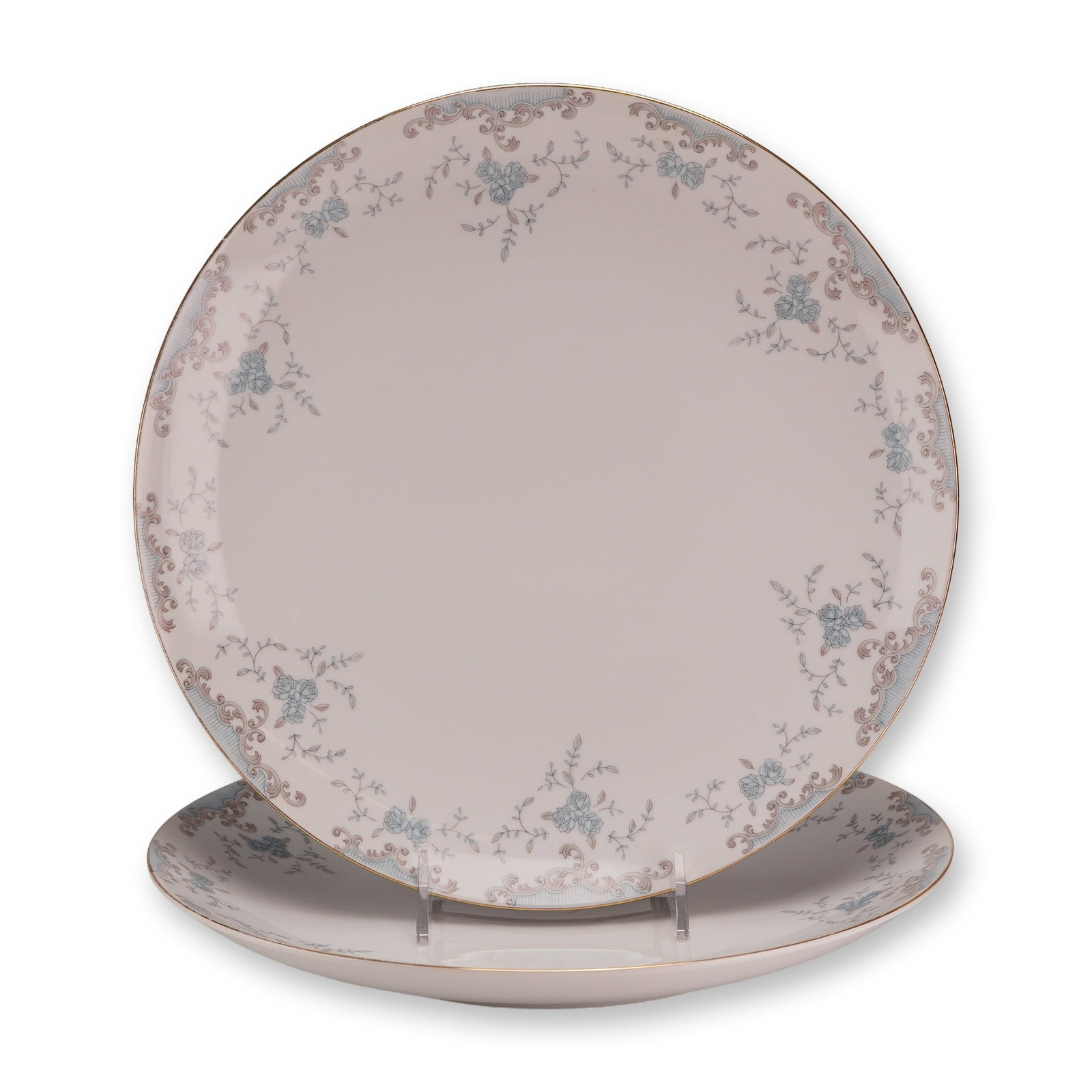Two Mikasa Fine China Service Plates, Seville: These items, from the Rubin Collection, were manufactured at the Narumi factory in Japan. The fine porcelain plates feature a white ground decorated with a transfer-printed border. The motif consists 