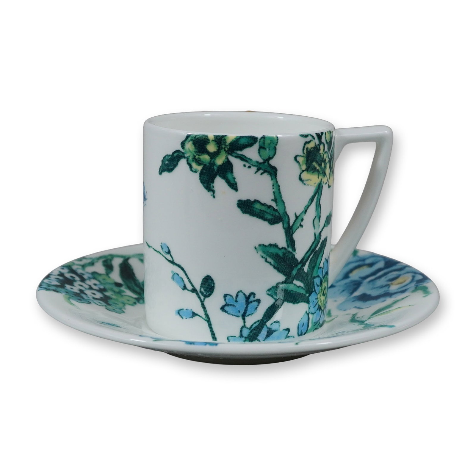 Wedgwood by Jasper Conran Chinoiserie White Bone China Espresso Cup and Saucer: This bone china espresso cup and saucer set was designed by Jasper Conran for Wedgwood in the Chinoiserie White pattern. The set features a cylindrical cup with a distinctive angular handle and a matc