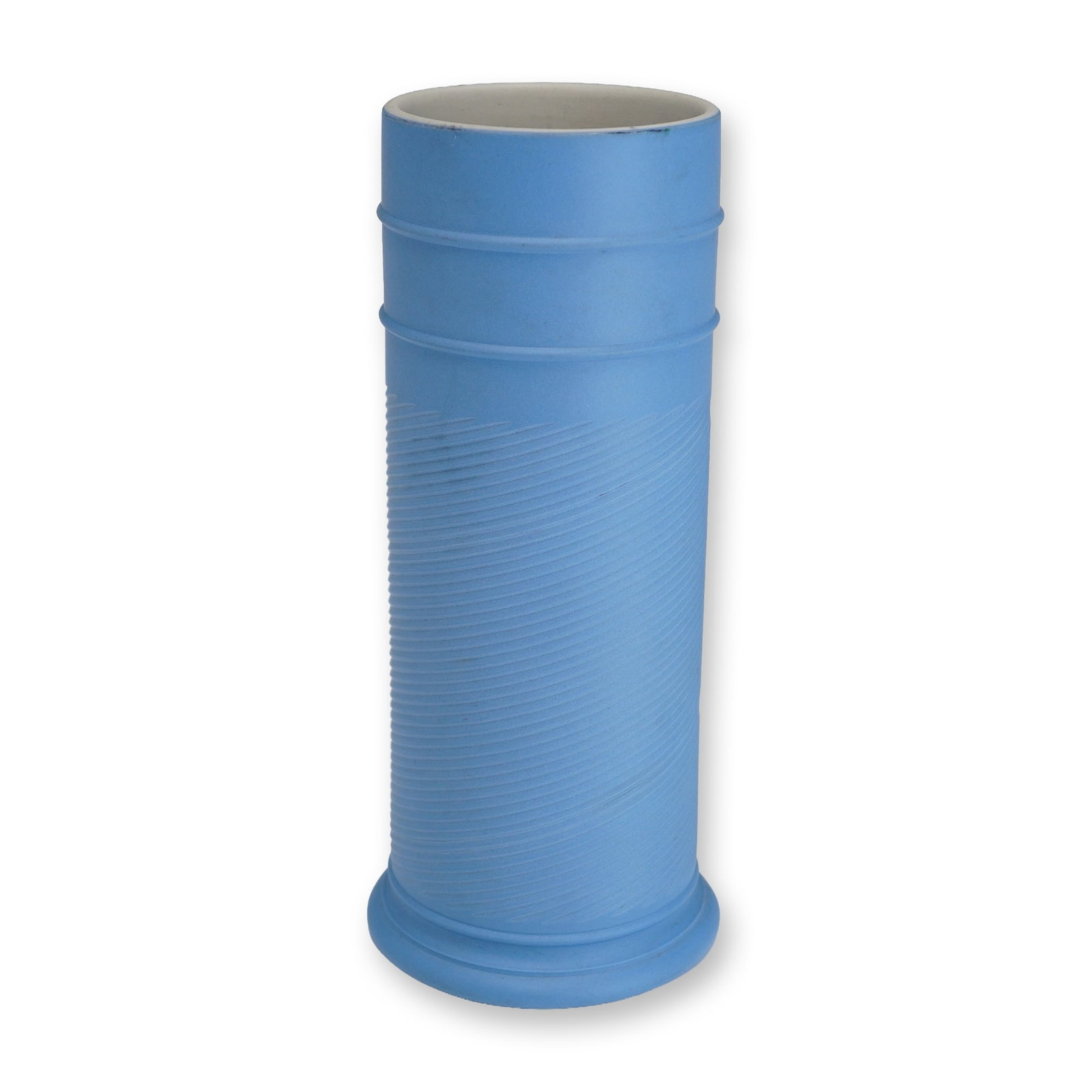 Contemporary Jasperware Style Cylindrical Studio Pottery Vase, circa 1980s: A contemporary studio ceramic vase executed in a jasperware-style matte-finished stoneware. The tall cylindrical vessel features a slightly flared base and an open rim. The exterior is finished in a p