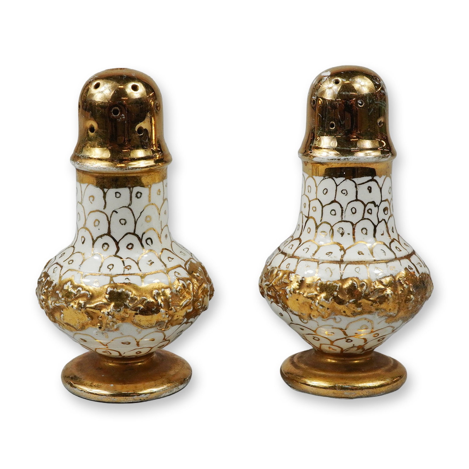 A Pair of Wedgwood Gilded Porcelain Salt and Pepper Shakers: A pair of Wedgwood porcelain salt and pepper shakers of bulbous form with tapered necks and flared, footed bases. The bodies feature a white ground decorated with a hand-painted gold fish scale patter