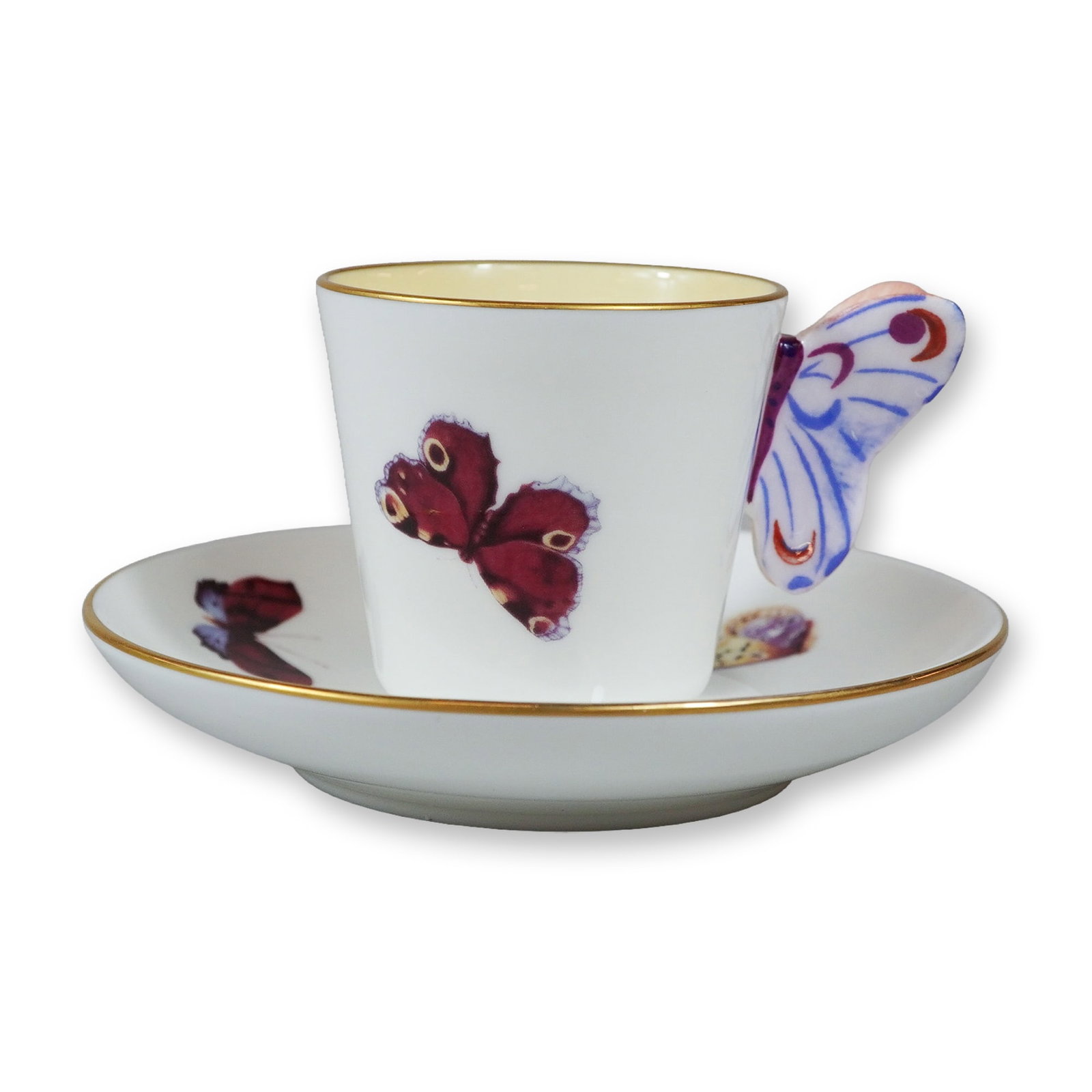 2pc Wedgwood Butterfly Pattern Bone China Small Cup and Saucer: This cup and saucer set is crafted from fine white bone china by Wedgwood in the Butterfly pattern, which is part of the Harlequin Collection. The set consists of a small cylindrical cup and a matchin