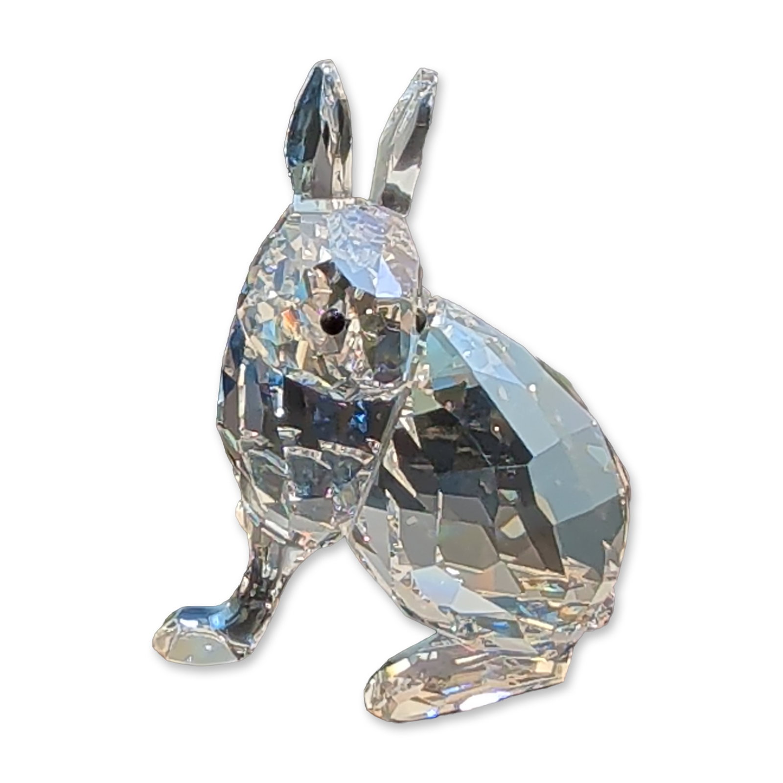 Swarovski Crystal Figurine, Arctic Hare: Swarovski Rabbit figurine in faceted clear lead crystal, featuring jet-black crystal cabochons for eyes. The piece is part of the Silver Crystal series and the 2011 SCS Event collection, that depicts 