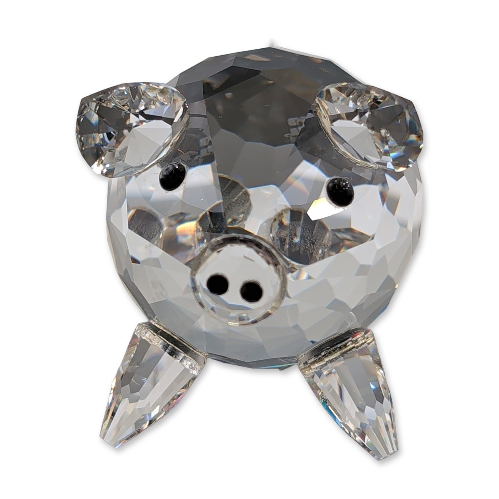 Swarovski Silver Crystal Faceted Lead Crystal Pig: Swarovski stylized pig figurine from the Silver Crystal collection in clear faceted lead crystal. The piece features a spherical faceted body, four pointed legs, pointed ears, and a curled tail. The e