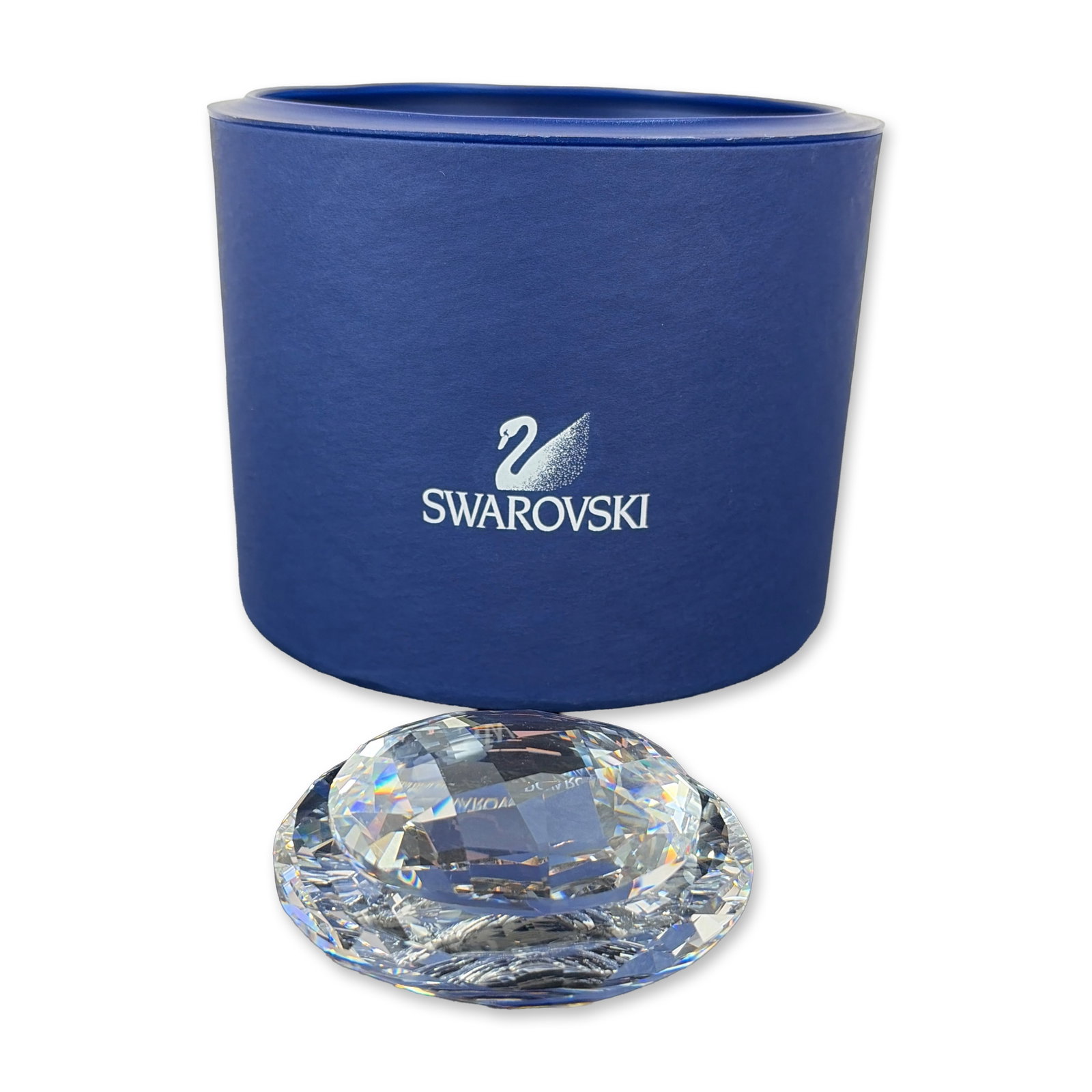 Swarovski 2005 SCS Tropical Jewelry Box: Swarovski Crystal Society Annual Edition. Tropical jewelry box in faceted clear crystal, featuring a two-piece design with a shallow circular base and matching domed lid. The crystal bears a laser-etc