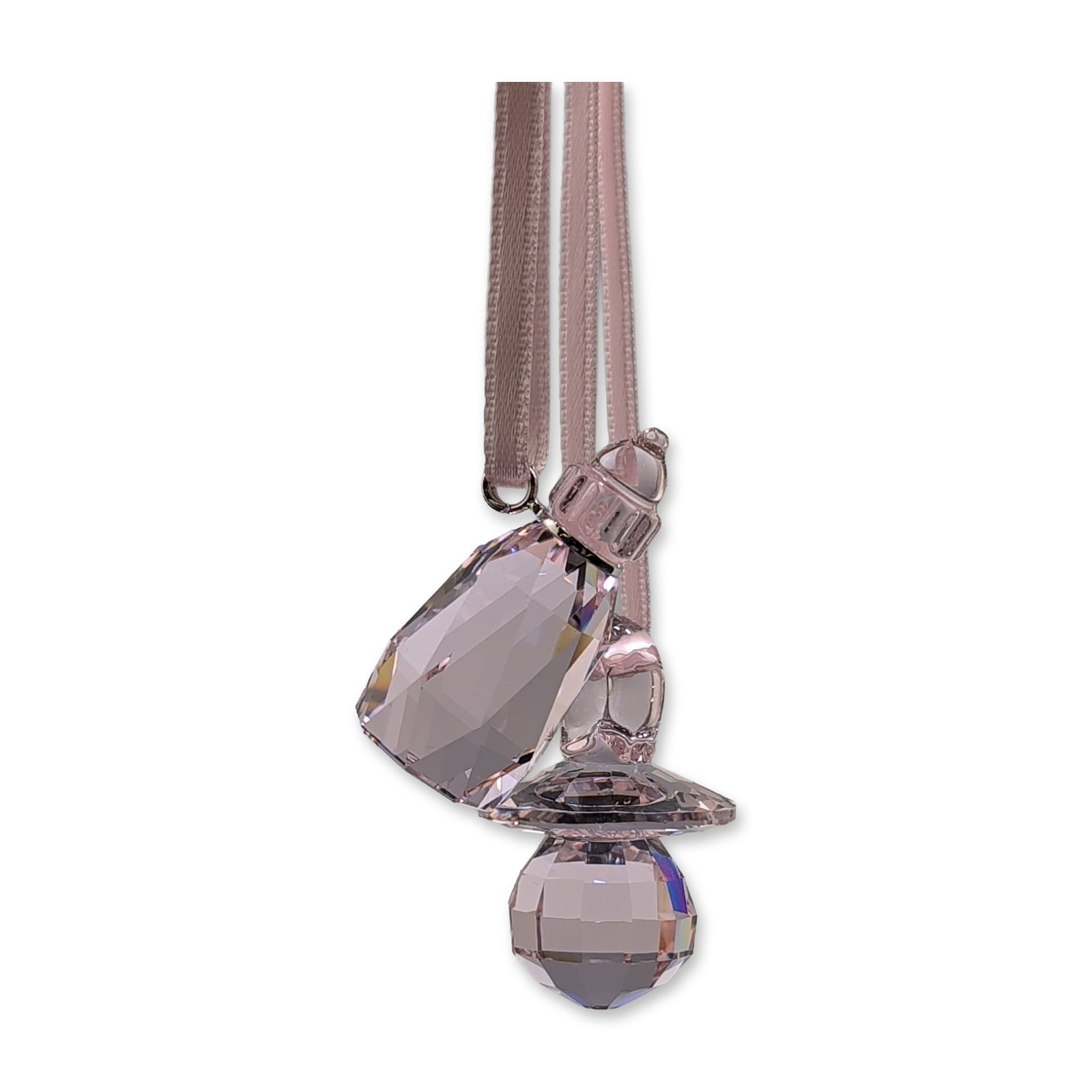 Swarovski Crystal Pink Rosaline Baby Bottle and Pacifier Ornaments: Swarovski. Pair of baby-themed ornaments in faceted light pink lead crystal, featuring one baby bottle and one pacifier. Each ornament is suspended from a light pink satin ribbon. The crystal elements